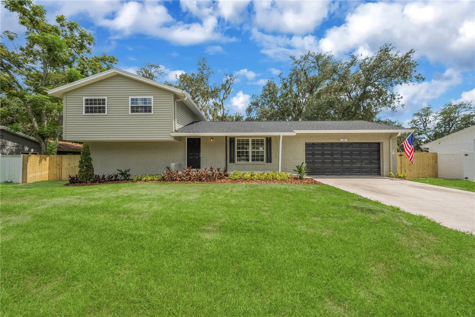 Get ready to FALL IN LOVE and live the Florida lifestyle with this charming 4-Bedroom, 3-Bathroom Brandon POOL HOME with NO HOA! This gorgeous home features wide-open living spaces with tons of natural light, and modern luxury plank flooring in all the living areas. The cozy family room is the perfect place to gather with family or host parties and dinners. The kitchen is a chef's dream with large prep areas and plenty of storage space. A HUGE WALL OF WINDOWS provides an amazing view of the pool, and so much natural light!  Luxurious ALL-WOOD cabinets, bright and modern QUARTZ COUNTERTOPS, and STAINLESS STEEL appliances come together to create a true centerpiece for gathering in the home.  The luxurious master retreat features a private en-suite bathroom, and loads of closet space to provide serenity and comfort. Three additional bedrooms and two more baths provide plenty of space for everyone to spread out. A cozy family room is the perfect place to gather with family or host parties and dinners, and leads you outside to a screened lanai, the perfect place for year round outdoor enjoyment. A huge fenced backyard, featuring a picture-perfect GIANT POOL is ideal for hosting friends and family... a true oasis for gatherings, playing with pets, or simply unwinding. A large bonus room makes the perfect game room, studio, gym, office, or apartment space for MULTI-GENERATIONAL living. This beauty has a BRAND NEW ROOF for years of worry-free enjoyment.  Other great features of this home include an indoor laundry space, fresh paint and brand new carpet. The Brandon area is a vibrant community that offers a range of exciting destinations, including shopping, restaurants, and parks. Everything's been done for you, so all you have to do is schedule your showing today, before this one is gone.