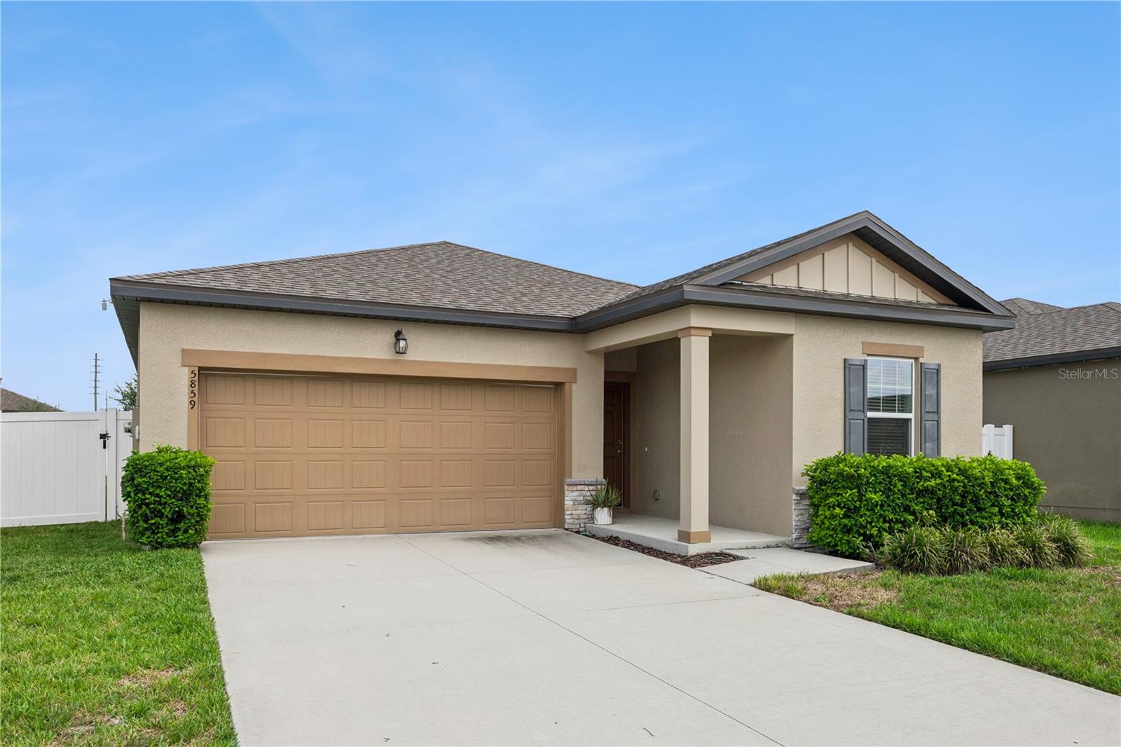 Beautifully maintained 2022 built home located in the rapidly growing area of St. Cloud! This move-in-ready residence offers 3 bedrooms, 2 bathrooms, and a spacious 2-car garage equipped with storage and a **220-volt outlet for electric vehicle charging**.

A welcoming covered front entry leads you inside, where you'll immediately appreciate the thoughtful SPLIT-BEDROOM FLOOR PLAN. Just off the foyer are two guest bedrooms separated by a full bathroom, creating the perfect space for family or visitors. Continue down the hallway and the home opens into a bright, expansive living area where the dining room, kitchen, and living room flow seamlessly together—ideal for entertaining and everyday living. **    

**The kitchen is the heart of the home, featuring modern cabinetry, granite countertops, stainless steel appliances, a large center island with seating, a walk-in pantry, and abundant counter space. Throughout the home you'll find **luxury vinyl plank flooring**, offering both style and easy maintenance.**    

**Privately situated at the rear of the home, the SPACIOUS PRIMARY SUITE provides plenty of room for a king-size bedroom set and additional furniture. The ENSUITE BATHROOM and generous WALK-IN closet complete this relaxing retreat. **    

Sliding glass doors from the living room lead to a covered lanai overlooking the fully fenced backyard with a low-maintenance **6-foot vinyl privacy fence**, creating the perfect setting for morning coffee, weekend barbecues, pets, or play.**    

Conveniently located near major roadways, shopping, dining, schools, and just minutes from the Lake Nona area, this home combines modern features, a functional layout, and an excellent location. Whether you're looking for your next home or a fantastic investment opportunity, this one is sure to impress. Schedule your private showing today!
