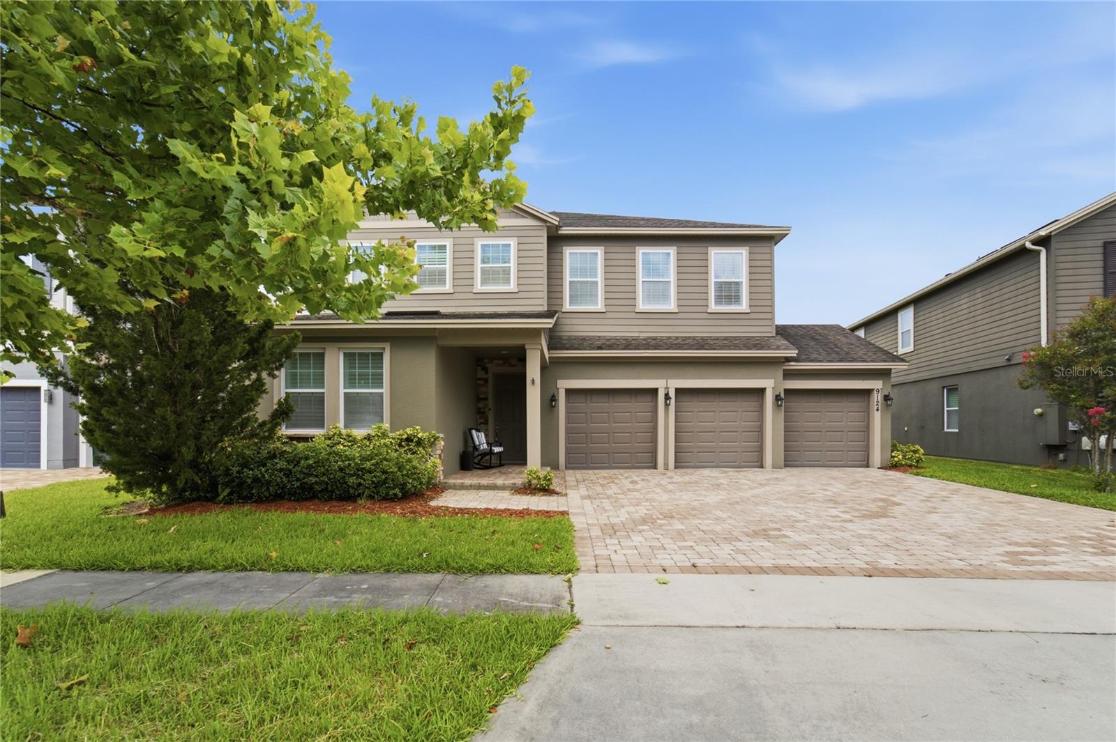 Welcome to a spacious and beautifully appointed lakeview home in the desirable Latham Park South community of Winter Garden. Offering 5 bedrooms, 4 full bathrooms, 1 half bath, and approximately 3,777 square feet, this impressive residence blends comfort, functionality, and elegant everyday living. The open-concept layout is designed for modern living, featuring a bright main living area, a stylish kitchen with a large center island, stainless steel appliances, and a walk-in pantry. The kitchen flows seamlessly into the dining and family spaces, creating an ideal setting for entertaining or relaxing at home.
Enjoy serene lake views from the home and take advantage of Latham Park South’s sought-after Winter Garden location, with access to community amenities and close proximity to Hamlin Town Center, shopping, dining, top-rated area schools, and SR-429. 
9124 Merlon Drive is a beautiful opportunity to enjoy space, style, and location in one of Winter Garden’s most desirable areas.