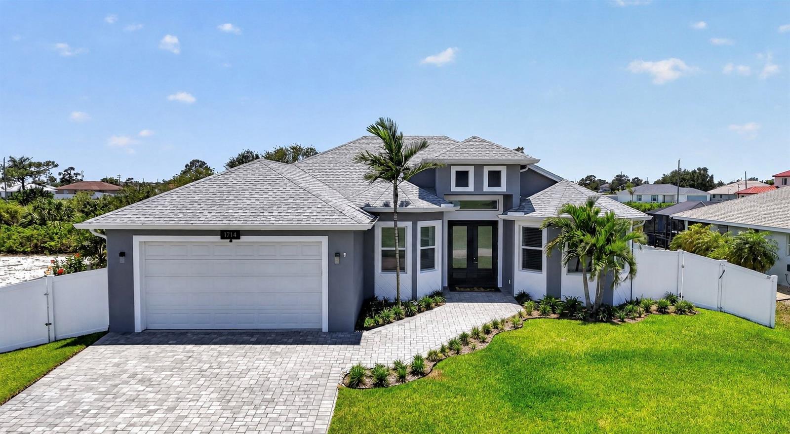 Quality and nothing left to do but move in and enjoy, are the first thoughts when describing this home. Where the upgrades/enhancements have already been done for you. Built in 2022 and enhanced with over $100,000 in premium improvements between 2024-2025, this Freshwater Canal Pool Home stands out in one of NW Cape Coral’s fastest-growing neighborhoods becoming known for its larger, higher-quality new homes. From impact-resistant windows and doors to Smart Home Integration, RO system, whole house generator (100 Gallon Monitored Propane Tank) this property offers a level of peace of mind combined with functionality rarely found in this price range... Inside, the thoughtfully designed layout features 3 bedrooms, 2 bathrooms, and over 2,000 sqft of living space — including a spacious & bright guest room that can easily function as a second master or private in-law suite. The kitchen was designed for those who truly enjoy cooking, complete with LG Signature induction cooktop, LG Studio wall oven & speed oven, exterior-vented hood, Bosch dishwasher, custom designed drawers, and expansive quartz countertop space. Additional highlights include a heated saltwater pool, Sonos speaker system (3 zones), 5.1 surround sound wiring, custom lighting, whole-house 2-inch blinds, monitored security system with cameras, HVAC soft start with UV air purification, Pentair Intelliflo variable speed pool pump, and over $33,000 in professional landscaping and palms alone. This is the type of home buyers wait for — modern, highly upgraded, meticulously maintained, and truly move-in ready with NOTHING left to do except enjoy the Southwest Florida lifestyle. And now you can, for a price below what the current owners paid, this home is priced to sell now!