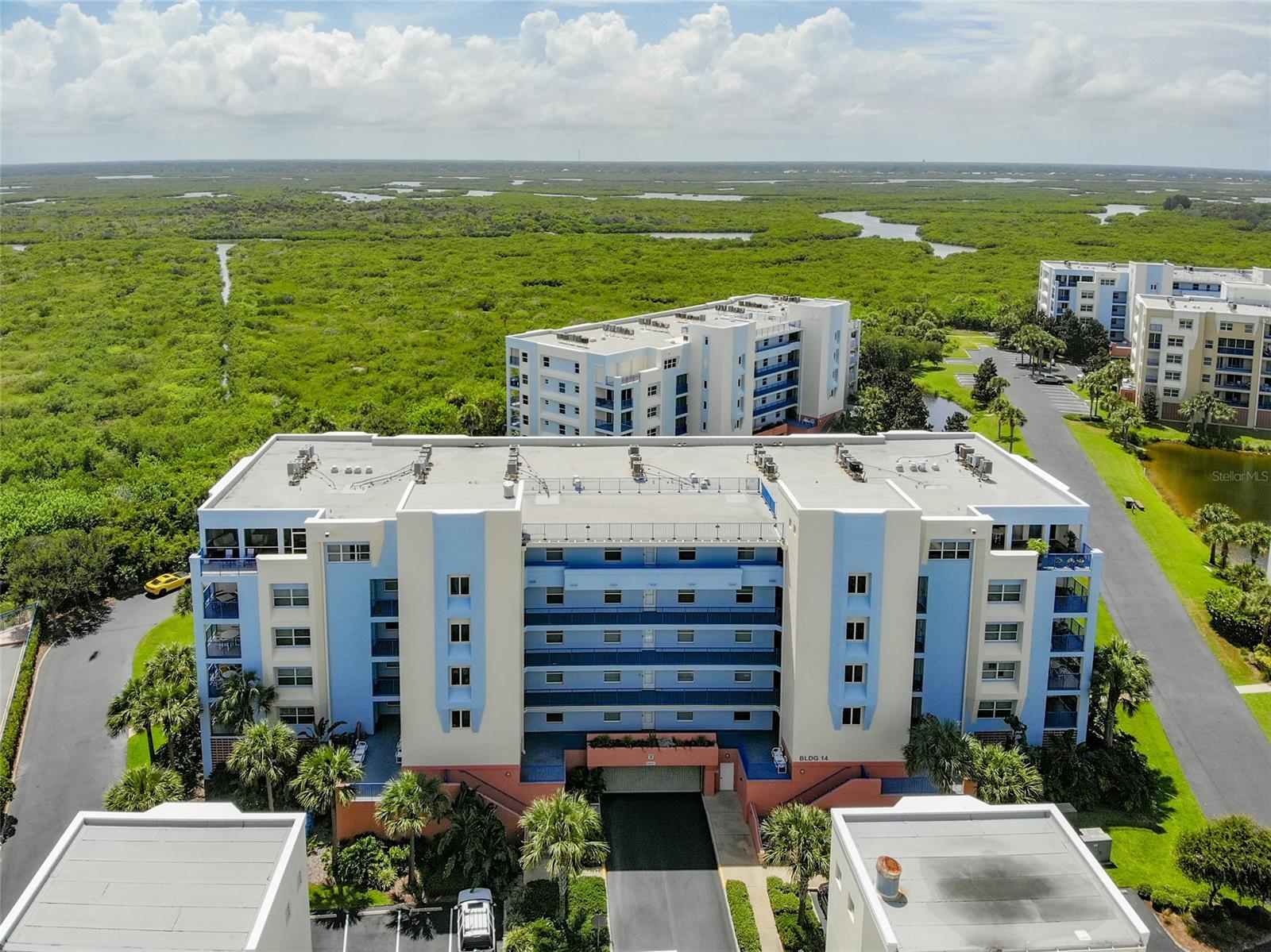 Luxurious 3BR/3BA condo on top 6th floor offers fabulous views of the Indian River Estuary & the Atlantic Ocean to the east.  Enjoy breathtaking sunsets from your private balcony which overlooks attractive landscaping & ponds with water fountains. Junior penthouse with two owners suites!  Built in 2008 & only one owner plus never rented!!  Brand new AC - October 2021.  This floorplan has 2,206 SF of living area with large utility room w/cabinets & washer/dryer, walk-in closets, underground parking & a storage closet on the same floor. Ceramic tile in foyer, kitchen, dining & living area, as well as all three baths. Carpeting for all 3 BRs! Plantation shutters in the bedrooms facing west and bamboo shades for the L/R slider. Kitchen offers gorgeous granite counter tops, beautiful white cabinetry, upgraded stainless appliances including glass top stove/oven, built-in micro, D/W, under cabinet lighting & a large pantry. Refrigerator does not convey with the sale. Granite counter tops & tiled shower enclosures in all 3 baths. Master bath has jacuzzi tub with separate walk-in shower & double vanities. Ocean Walk is a 1st class gated resort featuring amenities that include two club houses w/kitchens, heated pools & spas, Bar-B-Que areas, fitness centers, media room, sauna, lighted tennis courts, shuffle board, bocci court, a putting green & a riverfront nature trail boardwalk. ;LocationDescription: Condo ;Water: City