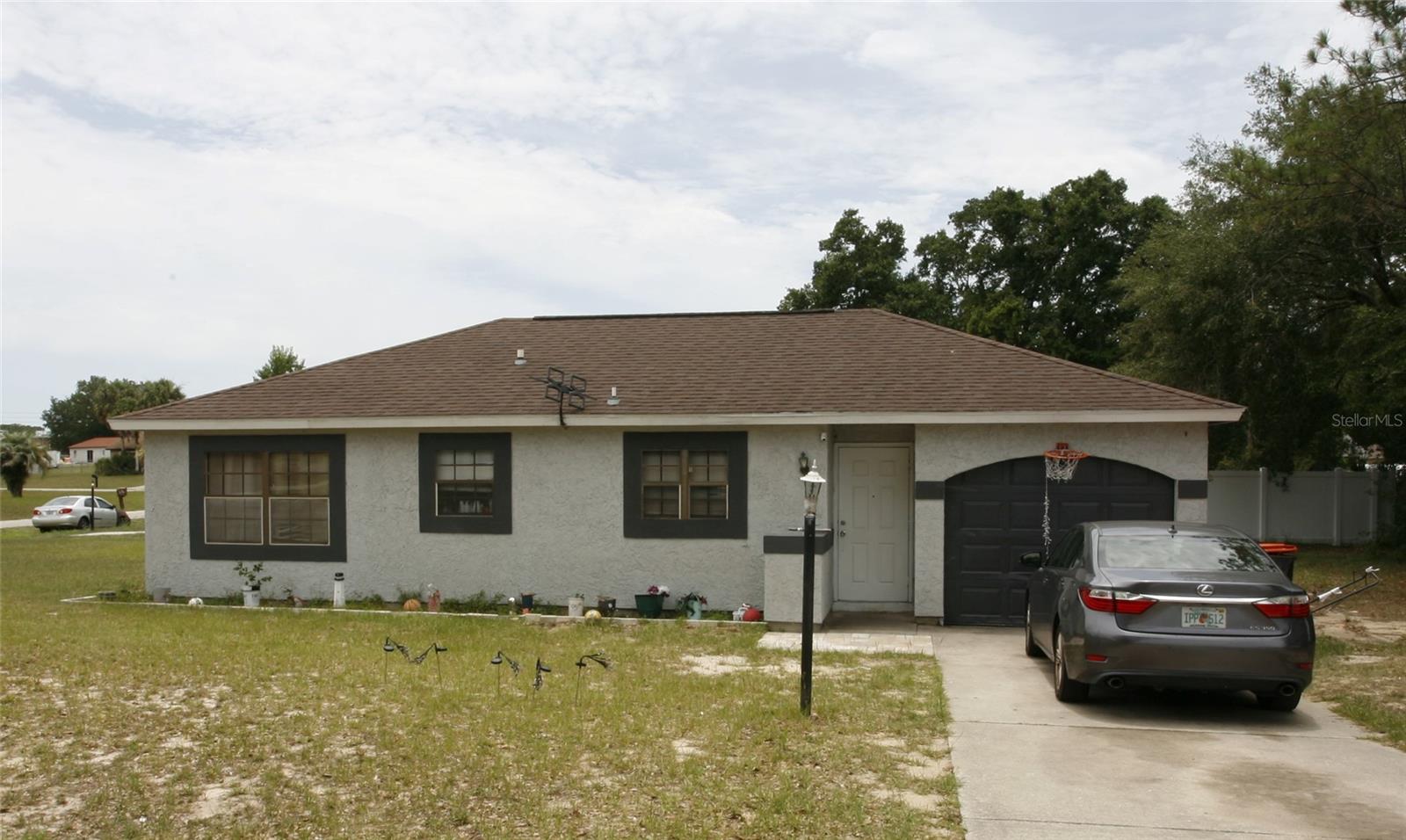 Discover the perfect blend of comfort and convenience in this well-maintained 2-bedroom, 2-bath home in Silver Springs Shores. Positioned on a generous corner lot, this inviting property features bright living spaces, a practical layout, and a 1-car garage. Enjoy easy access to nearby shopping, restaurants, parks, and everyday amenities while being tucked away in an established neighborhood. With plenty of potential to make it your own, this home is ready for its next owner. Don't miss this opportunity to own a piece of Ocala living!