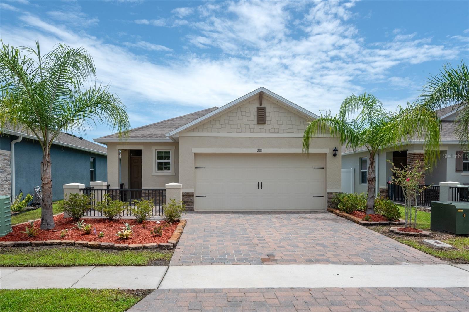 Move-in ready 3 bedroom, 2 bath home with pond views in Venetian Bay, New Smyrna Beach. Crisp and clean with new interior paint, new carpet, and new appliances throughout. Ceiling fans in every room, smart home ready, and built-in garage shelving. A screened back patio is approved and paid for — awaiting permit for installation. Venetian Bay is a lifestyle community with over 20 miles of paved, tree-lined paths excellent for evening strolls, bike rides, or jogging. Enjoy shops and restaurants at the Town Center, days at the Beach and Swim Club, or a round of golf on the championship course. The location delivers: I-95 in 8 minutes, I-4 in 15, the beach in 20, and Daytona International Speedway in 22. Walmart is 7 minutes away, AdventHealth 13, and Daytona State College and Embry-Riddle 25. Orlando attractions — Disney, Universal, SeaWorld — are about 1 hour 20 minutes, with Orlando International Airport just over an hour. Elementary, middle, and high schools are all within 15 minutes. New paint, new carpet, new appliances, pond view lot in one of New Smyrna Beach's most sought-after communities.