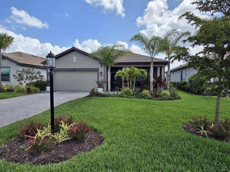 Welcome to this upgraded home in the gated community of Verdana Village, offering privacy, modern upgrades, and great indoor-outdoor living. The property features over $150,000 in post-construction upgrades, including a custom natural gas-heated saltwater pool and spa with smart automation and a screened front porch, perfect for relaxing or entertaining. Inside, the open floor plan includes tile flooring throughout, a bright living area, and a modern kitchen with stainless steel appliances. The split-bedroom layout provides privacy, featuring a spacious primary suite with an oversized walk-in shower plus two additional bedrooms and bathrooms. Additional features include hurricane impact windows, a tankless water heater, and a screened front porch. Located just one block from the West Amenity Center, residents enjoy easy access to the resort-style pool, clubhouse, fitness center, and social spaces.