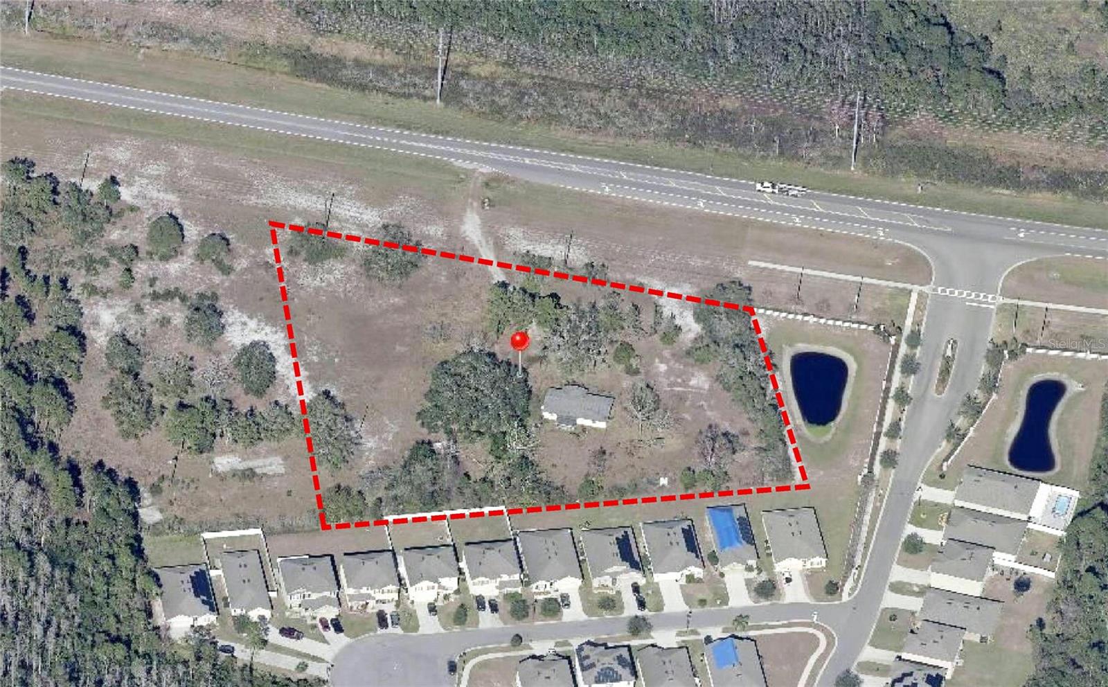 THIS PROPERTY HAS BEEN REZONED TO CCP ZONING WHICH ALLOW MULTIFAMIL AT 18 UNITS FOR EACH ACRE OR COMMERCIAL, PLUS OTHER USES. THE HOUSE ON THE PROPERTY IS BEING TORN DOWN AND HAS NO VALUE. ENGINEER EVALUATION WAS 46 UNITS COULD BE CONSTRUCTED ON THIS SITE.  IT IS 2.56 ACRES- HIGH & DRY NO WETLANDS. THE VACANT LAND TO WEST IS ALSO +/- 2.5 ACRES MOST LIKELY IS AVAILABLE. THIS PROPERTY NEAR THE NEW VISIONS DEVELOPMENT AND REUNION. WATER & SEWER CONNECTIONS ARE AT
SULLIVAN ROAD. PRICE WAS DEVELOPED TAKING IN TO ACCOUNTY THE COST TO RUN SERVICE TEO SITE.