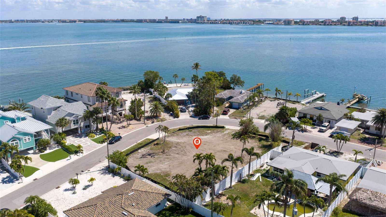 LARGEST SINGEL FAMILY HOME LOT AVAILABLE  IN ST PETE PEACH !!!!  PRIME COASTAL DOUBLE LOT WITH DEVELOPMENT POTENTIAL!
An exceptional opportunity to own a prime coastal property in one of Florida's most desirable barrier-island communities. This 15,000 + sq. ft. 147X102 corner lot-comprised of two lots being sold as one parcel-offers unparalleled visibility and generous space for a luxury coastal residence, private estate, or signature development project.
Located on Boca Ciega Isle Drive, the double lot sits at the end of a charming island community, surrounded by panoramic water views and upscale custom residences in a quite, established neighborhood.
Enjoy the ultimate Florida lifestyle with easy golf cart, bike or walking access to the powder-soft white sands of the Gulf of America and the tranquil waters of Boca Ciega Bay. The location also places you minutes from local landmarks including the historic Don Ce Sar hotel, beautiful Pass-a-grill Beach, and the vibrant waterfront dining and shopping of St Petersburg.
Drive across the small bridge onto Boca Ciega Isle Drive and discover a scheduled coastal enclave offering privacy, prestige and breathtaking sunsets.
Opportunities to secure land of this size and location on St. Pete Beach are extremely rare -making this property a truly unique investment or dream homesite.