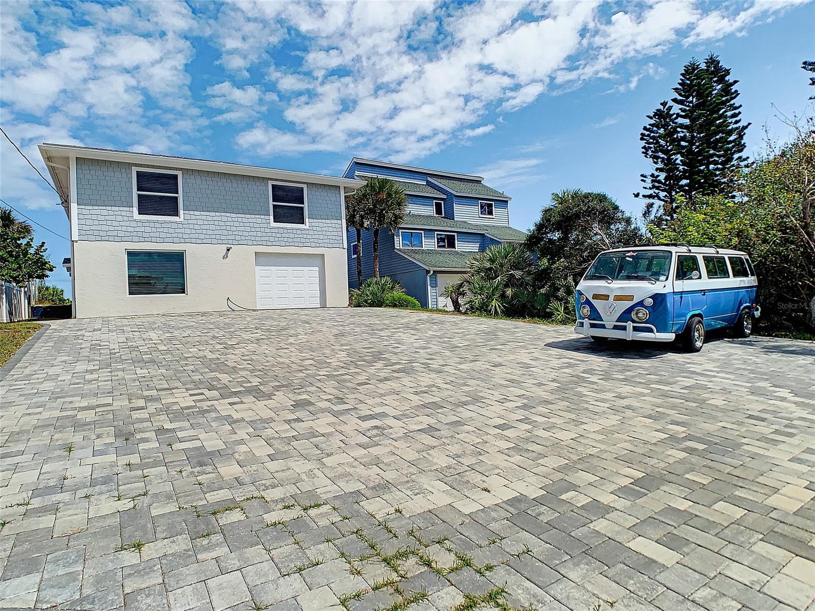 This beautiful direct oceanfront home was fully renovated in 2019 with a large deck, tiki hut with swing, shower and steps down to the beach.  Living room, kitchen, two bedrooms and two baths are upstairs.  Family room, two bedrooms, one bath and one car garage located downstairs. Located on the no driving beach.  Would make a great seasonal rental. ;Water: City