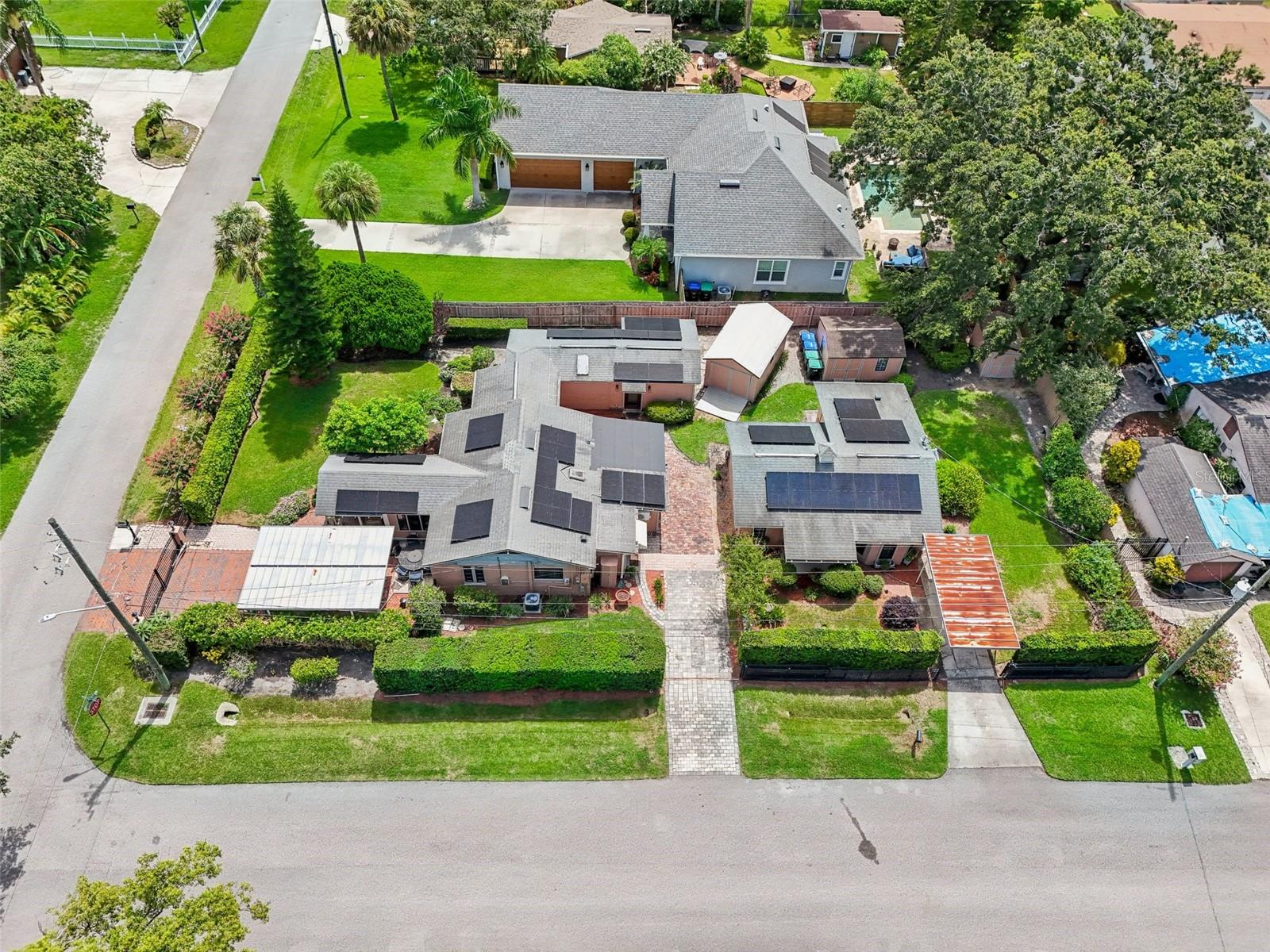 3 Driveways • 3 Entrances • 2 Homes! Incredible Investment Opportunity in the Heart of College Park / Downtown Orlando! Welcome to this rare and versatile property situated on a spacious corner lot of nearly 1/4 acre in highly desirable College Park! Featuring two separate homes, fully fenced and gated grounds, and multiple private entrances, this property offers endless possibilities for homeowners, investors, multi-generational living, or short-term rental income. The main residence facing Venetian offers: 2 Bedrooms, Dedicated Office, 2 Fully Renovated Bathrooms (2021), Potential space for a kitchenette conversion.Inside, you’re welcomed by a bright foyer leading into the spacious living and dining areas with beautifully refinished hardwood floors (2023). The office connects directly to the primary suite, which features a fully renovated bathroom and private exterior access. The secondary bedroom also includes: A fully remodeled bathroom (2021), Private entrance access , Flexible layout with potential for a private efficiency/in-law suite. The kitchen is equipped with natural gas appliances and sits at the rear of the home for added functionality and privacy. Detached Guest House / In-Law Suite Currently operating successfully as an Airbnb, the detached guest house generated: $25,000–$32,000 annually. Over $32,000 in 2023 alone  This fully renovated (2019) guest home includes: 1 Bedroom, 1 Bathroom, Full Kitchen, Washer and Dryer, Tankless Gas Water Heater and owner is willing to sell fully furnished.  Major Updates & Features-Solar panels fully paid off at closing , Extremely low electric bills (under $100/month at peak usage), Septic system replaced in 2010, New drain field installed in 2024, Main house AC replaced in 2021, Fully fenced and gated property, Three separate driveways and entrances. Whether you’re looking for a primary residence with income potential or a turnkey investment property, this unique College Park gem checks every box. Schedule your private showing today before this home is SOLD!