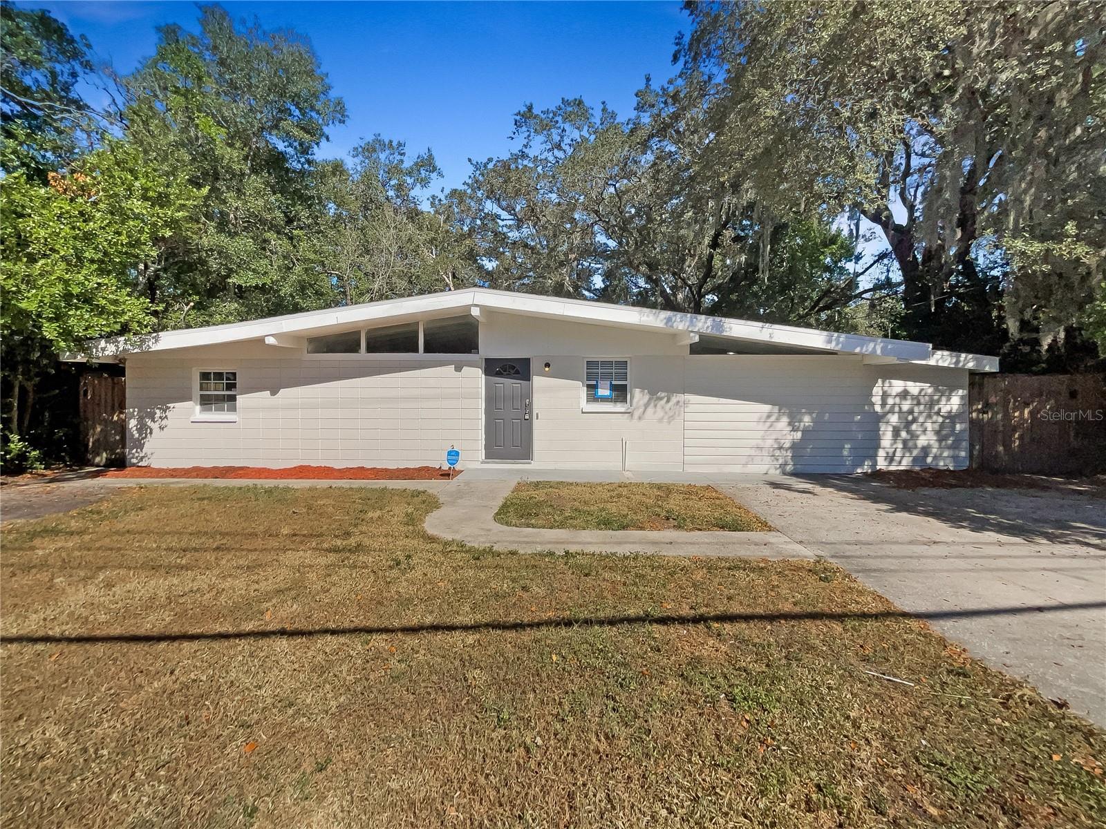One or more photo(s) has been virtually staged. This charming 3-bedroom home in a quiet neighborhood offers a natural color palette and fresh interior paint throughout. The flexible living space includes other rooms for a variety of uses, and the primary bathroom has double sinks and good under sink storage. Enjoy outdoor living in the fenced in backyard, complete with a sitting area to relax and entertain. This home has all the features you need to make it your own!