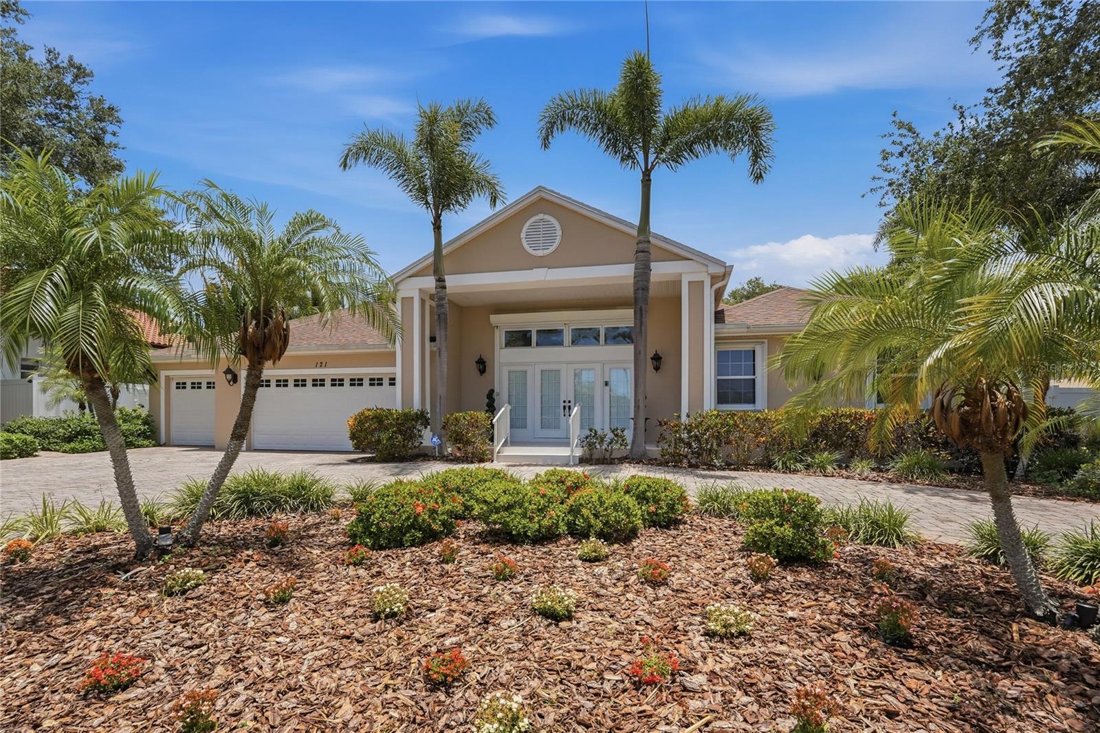 Welcome to the Picturesque Harbor Bluffs Community.  This home is located on a street of multi-million dollar homes.  This home offers a perfect blend of comfort and convenience.  The open floor concept  is significant for entertaining.  The entrance features 2-1/2 ft by 5 ft Beautiful travertine tile and a exquisite fireplace with a step up to the wood flooring in the dining, family room and the kitchen.  Gourmet kitchen is a cooks dream featuring stainless steel appliances, gas-fueled stove, corian countertops and a breakfast bar that features seating for 6.  The split bedroom plan features a large master bedroom with two walk in closets with french doors to the covered and screened patio
EXTENSIVE FEATURES INCLUDE:
Two zones of central heat,  Natural Gas Generac Generator, Hurricane Shutters, (motorized and accordion shutters throughout) crown molding and  a natural gas heated  spa. Have Peace of mind knowing that every opening has hurricane shutters, hurricane rated garage doors and a natural gas Generac Generator powering the whole house.  The 3 car garage is well organized with an epoxy floor and high ceilings and generous storage.   The circular driveway has pavers and welcoming plantings.  French doors  open into a very spacious screened patio with xeriscape plantings throughout and a fenced yard for privacy.
Conveniently located just minutes from private and public golf courses, prestine beaches, shopping and great dinning. 
UNBEATABLE LOCATION that requires no flood insurance.  DON'T miss out on this SPECTACULAR PROPERTY!