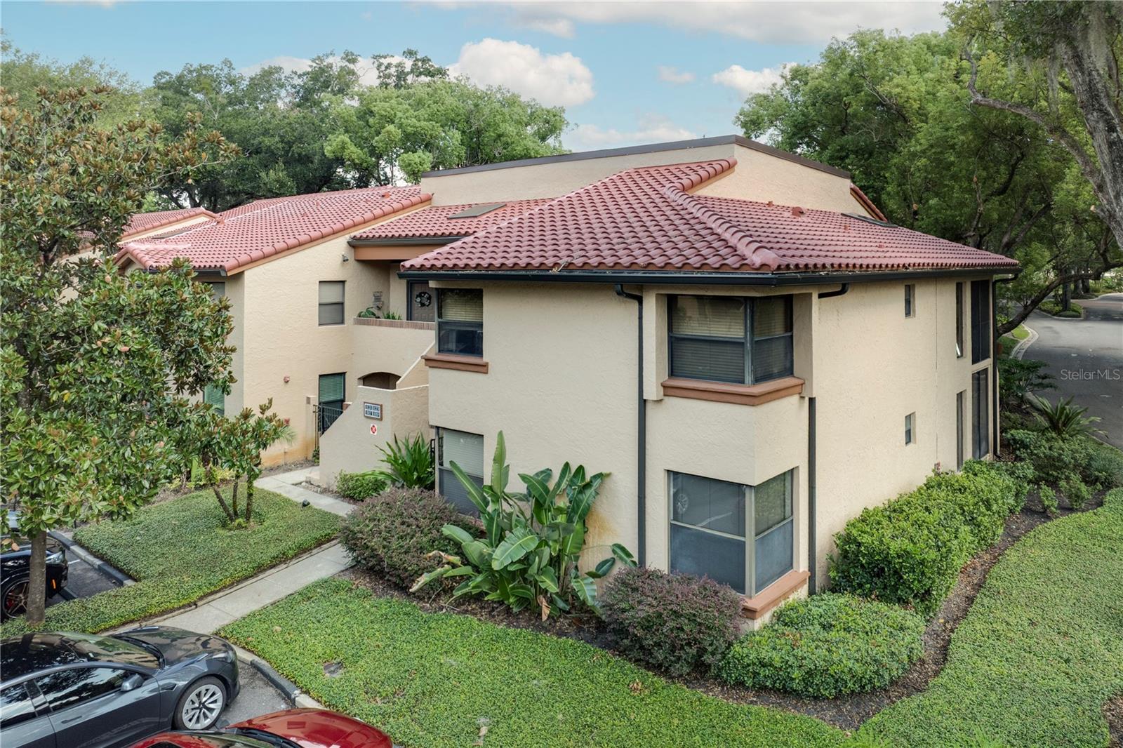 Welcome to La Costa Brava Lakeside Condominiums, a peaceful lakefront community on Lake Pineloch just minutes from Downtown Orlando. This spacious 2-bedroom, 2-bath condo offers 1,380 sq ft of comfortable living with a generous layout, split bedrooms. The home is ready for your personal updates, offering solid bones and excellent potential for customization. Residents enjoy resort-style amenities including two pools, a lakefront clubhouse, fitness center, and community lock with access to kayaking and paddleboarding. The community features electric utilities, private loads, and sits in Flood Zone X for added peace of mind. HOA covers exterior maintenance, landscaping, and common-area utilities. Conveniently located near Orange Avenue, Michigan Street, major hospitals, and key commuter routes, this condo blends lakeside tranquility with unbeatable city convenience - ideal for buyers seeking space, value, and the opportunity to make it their own. Recent assessments for new roof have been paid in full. This unit also includes a dedicated carport (#43) that will convey with property.