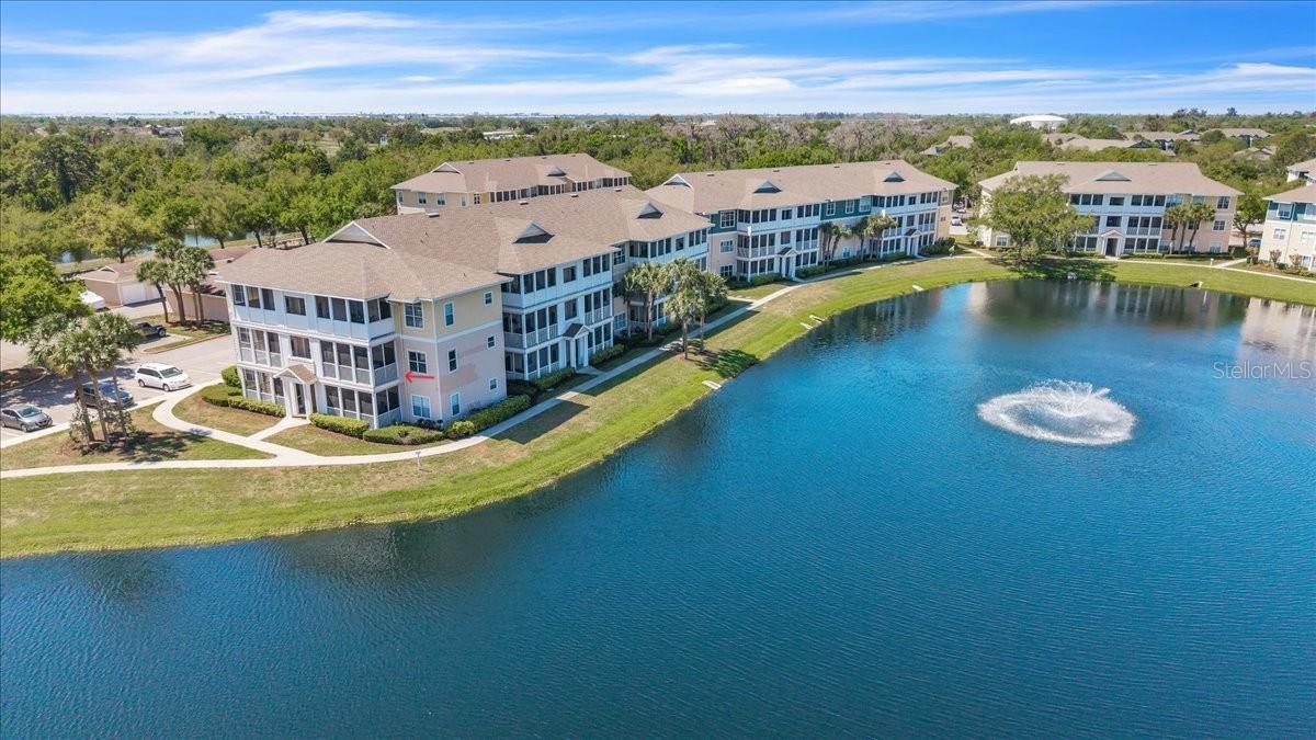 Welcome to The Palms of Cortez, a secure gated community ideally located in the heart of Bradenton, where comfort, convenience, and the Florida lifestyle come together. This beautifully updated second-floor one-bedroom condo features a private balcony with both lake and pool views—an ideal setting to relax and enjoy the peaceful surroundings. Inside, the living and dining areas showcase rich cherry hardwood flooring, enhanced by elegant crown molding and cherry wood plantation shutters throughout, adding warmth, character, and timeless appeal. The thoughtfully designed floor plan offers a seamless flow for both everyday living and entertaining. The updated kitchen overlooks the living and dining areas and is tastefully appointed with solid cherrywood cabinetry, granite countertops with a matching backsplash, stainless steel appliances and a convenient breakfast bar—perfectly blending function and classic style. The spacious primary bedroom features tile flooring and a walk-in closet, providing generous storage. The attached full bath is finished with a granite-top cherry hardwood vanity and vessel sink for a touch of modern design. For added convenience, the unit includes an interior laundry closet with a washer and dryer, as well as additional storage space to keep everything organized. Step out onto your private balcony to enjoy peaceful surroundings and Florida’s beautiful year-round weather—an ideal spot for morning coffee or evening relaxation. Residents of The Palms of Cortez enjoy access to a variety of amenities, including a clubhouse with a fitness center and gathering space, a resort-style swimming pool, tennis courts, picnic areas, and a playground—offering something for everyone. The location is hard to beat, with close proximity to the Gulf beaches of Anna Maria Island and Bradenton Beach, as well as convenient access to shopping, dining and daily essentials. Downtown Bradenton and Sarasota are just a short drive away, offering waterfront attractions, restaurants, arts, and entertainment. Whether you’re searching for a primary residence, vacation getaway, or investment property, this condo presents an excellent opportunity to enjoy low-maintenance living in a highly desirable Bradenton location. **PLEASE ENJOY THE 3D INTERACTIVE VIRTUAL TOUR ASSOCIATED WITH THIS LISTING**