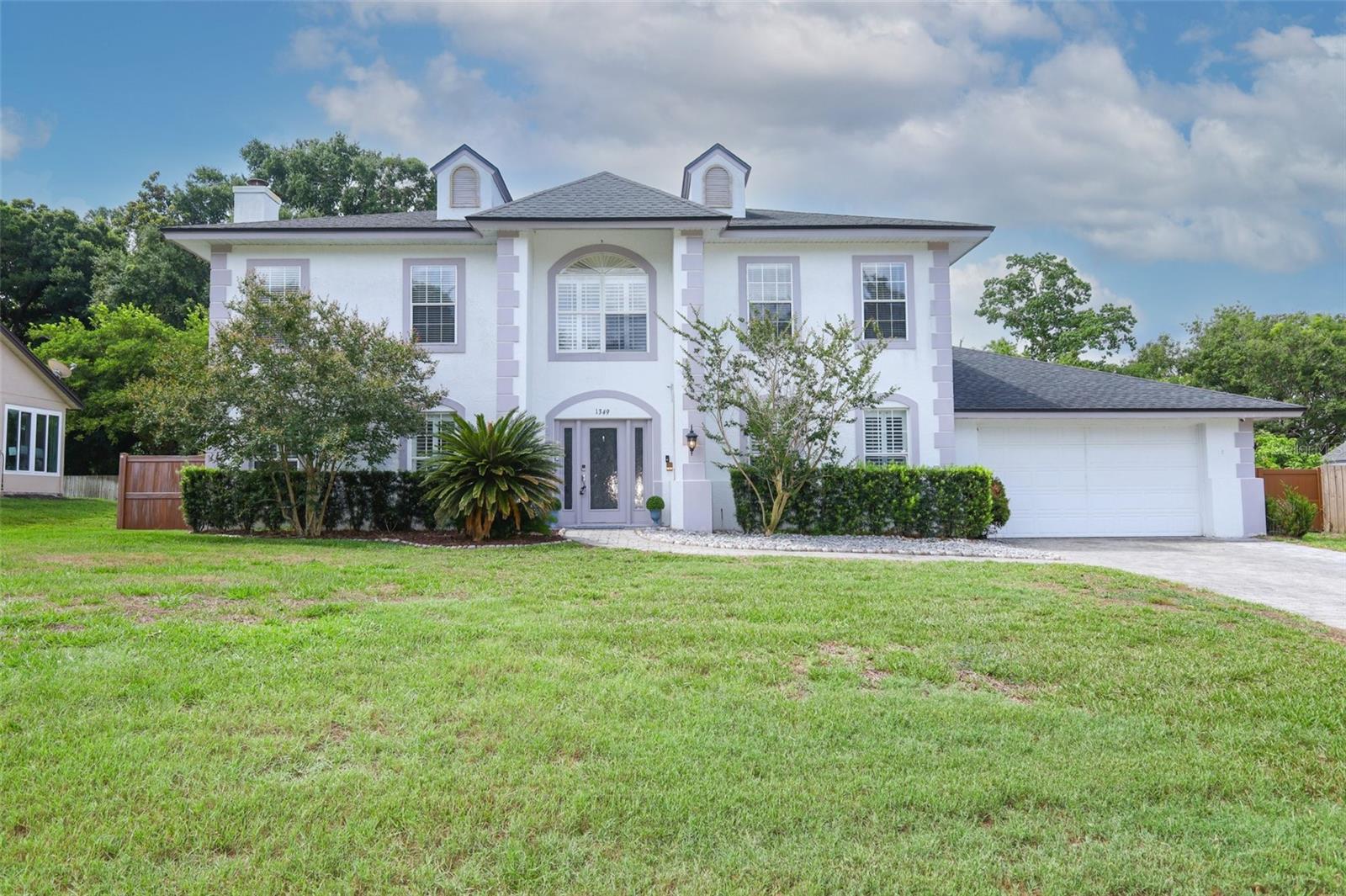 Welcome to this beautiful custom-built home in the coveted gated community of Sweetwater West — offering over 3,500 square feet of flexible living space designed for multigenerational living, large families or those who love to entertain. Featuring 6 bedrooms, 4 FULL EN SUITE bathrooms, and 2 half bathrooms, this thoughtfully designed floor plan offers endless possibilities for growing families, hosting guests, work-from-home needs, or private in-law accommodations.

Recent major updates include a new ROOF (2022), FRENCH DOORS (2022), community wide replumbing completed in 2022, and a stunning solar-heated SALTWATER POOL (2020) for year-round enjoyment!
The first floor includes a spacious 2019 renovated kitchen (Stovetop 2025), formal dining room, FRESHLY PAINTED formal living room with cozy wood-burning fireplace, expansive great room with a second wood-burning stone fireplace, plus a versatile office/guest suite/in-law space with en-suite bathroom — ideal as a secondary primary suite or private guest retreat! Large inside laundry room gives way to a pool bath for convenience and ease!

Upstairs, the primary suite includes an adjoining flex room perfect for a nursery, office, gym, or sitting room. Four of the six bedrooms feature private en-suite bathrooms, creating exceptional comfort and privacy throughout the home. Natural light pours into every space! Custom details include stunning crown molding, timeless french doors, plantation shutters, and abundant storage to include a massive walk-in closet under the stairs. Additional upgrades include TWO AC units (2023/2019), and a paver driveway (2023) with extended parking. The 2+ car garage features BONUS space with side-entry door for backyard access/ease as well as tandem space for workshop/storage/boat or jetski parking!

Step outside into your backyard oasis featuring an inviting saltwater pool with water feature, installed in 2020! Plus, an extended patio giving both covered and uncovered space to enjoy year-round! Tried and true space for entertaining, relaxing, or even a friendly basketball game poolside.

IDEALLY located with convenient access to Wekiwa Springs State Park's natural springs, hiking trails and canoeing, nearby shopping, dining and entertainment in Sweetwater, Apopka & Altamonte Springs and world-famous theme parks including Walt Disney World! Combining idyllic location, floor plan flexibility, and resort-style outdoor living, this exceptional home delivers Florida living at its finest! Schedule your appointment TODAY!