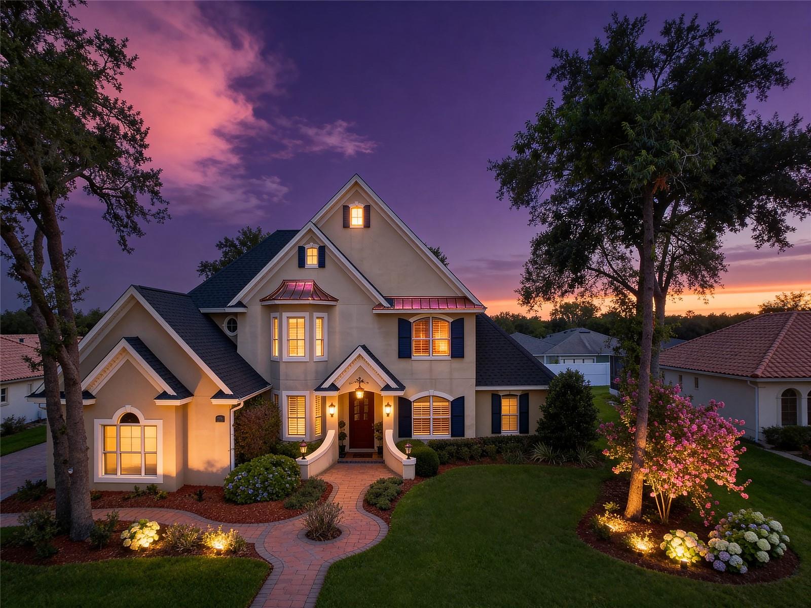 Nestled within the gated community of Ashton Oaks, this exceptional 5 bedroom home offers an elevated blend of sophistication, comfort, and timeless design in one of Lakeland’s most desirable settings. Thoughtfully updated and impeccably maintained, every detail of this home has been curated to deliver refined living at its finest. Built by Tapia Construction, the home showcases quality craftsmanship and a seamless flow designed for both upscale entertaining and everyday comfort. Expansive living spaces are filled with natural light and elegant finishes throughout. This home features two ensuite bedrooms, including a luxurious primary suite downstairs and an additional ensuite upstairs, ideal for guests or multigenerational living. The beautifully appointed kitchen features stainless steel appliances, a spacious walk-in pantry, and an ideal layout that perfectly balances style and functionality. The heart of the home extends effortlessly outdoors to your private resort-style oasis, featuring a stunning saltwater pool and screened enclosure completed in 2020, creating the perfect setting to enjoy Florida living year-round. Recent high-value upgrades provide peace of mind and modern convenience, including a new roof (2023), a tankless water heater (2019), and updated A/C. A spacious 3 car garage offers ample room for vehicles, storage, and recreational equipment while complementing the home’s impressive curb appeal. From quiet evenings poolside to hosting unforgettable gatherings, this home offers the ideal balance of elegance and comfort. Perfectly positioned near premier dining, shopping, golf, and all that Lakeland has to offer, this remarkable property presents a rare opportunity to experience luxury living in a private gated enclave. Call for your private showing!
