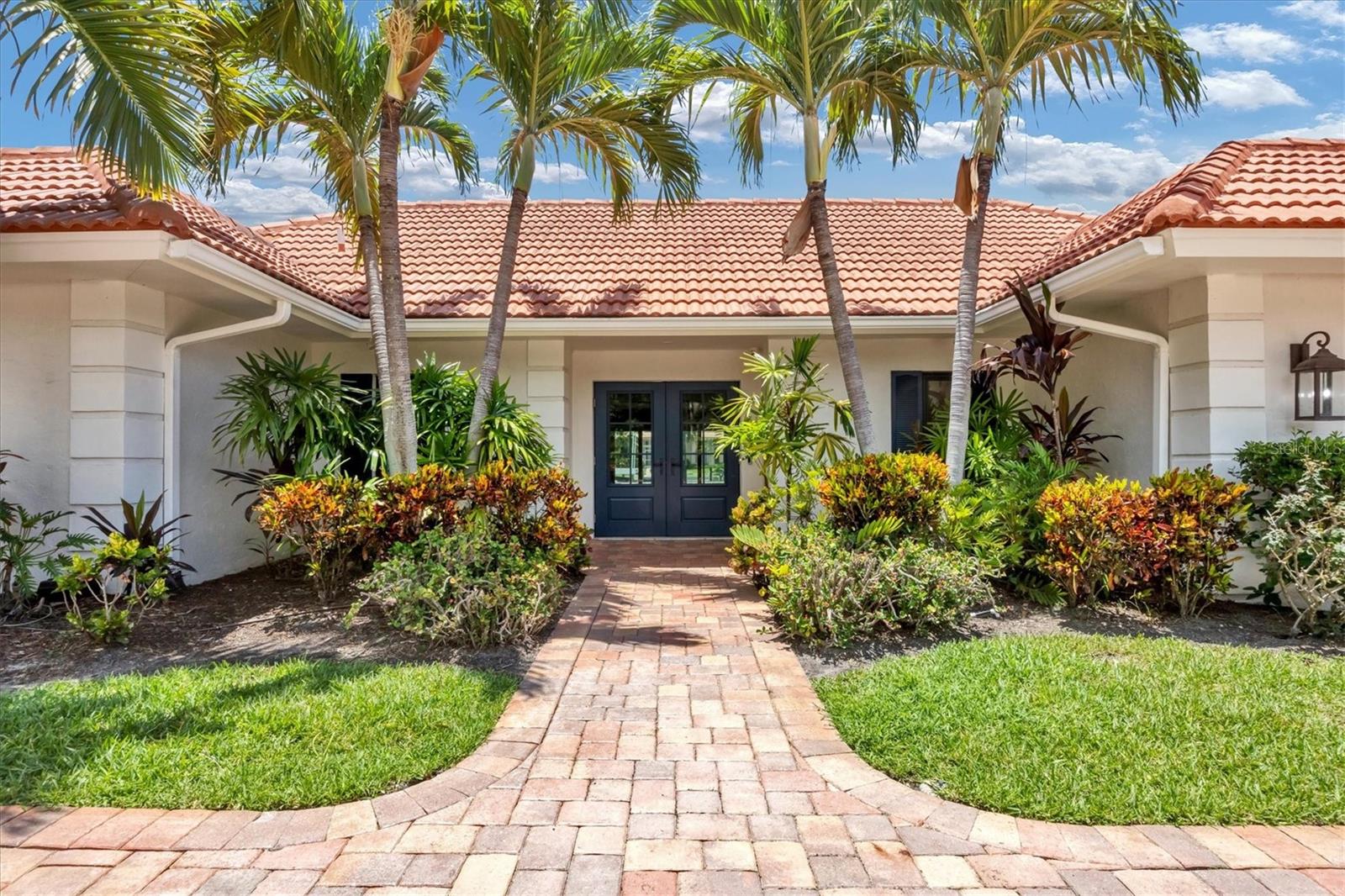 410 Meadow Lark did not experience any water intrusion or damage do the home during Helene or Milton, the home is move in ready! Welcome to waterfront living on one of the most desirable streets in the sought-after Bird Key neighborhood. Positioned towards the end of the cul de sac and featuring open water and canal homes on either side of the street. This well-maintained four-bedroom residence features an open-concept floor plan featuring well-defined areas for easy entertaining. The main living and dining areas have an open and airy atmosphere with impact sliding doors and windows, allowing the updated pool area and waterfront to be viewed. The living and dining area flows into the gourmet kitchen, boasting views of the waterfront and pool area, with another set of sliders accessing the lanai. The spacious kitchen allows for an additional informal dining area. Plentiful cabinet and storage, ample counter space, and stainless appliances are fit for an owner who loves to cook and entertain. Off of the kitchen is a media room or optional office space that can also be accessed off the main living area by French doors making it the ultimate in flex space. A sizeable laundry room connects the kitchen to the two-car garage with epoxied flooring. This ideal floor plan has the primary suite at the back of the home, with access to the pool area, open water views, and a walk-in closet with a closet system. The remaining three bedrooms are at the front of the house, with access to a full bath and half bath. The home features many upgrades like impact windows, sliders, and doors, two updated HVAC units, ductwork, spray foam in the attic, an electric pool heater, and a Pentair system to control the pool and spa. Updated pool pavers, resurfaced pool, spa, and irrigation well. A boat dock with electricity and water, sailboat-deep water, a 16,000 lb boat lift, and a floating dock perfect for the boater who dreams of an active water lifestyle. Bird Key living is the epitome of total convenience as you're close to the sandy beaches of Lido and the dining and shopping options at St. Armand Circle. Just over the bridge is downtown's fine shopping, world-class dining, cultural activities, A-rated Schools, and Hospitals. Experience the perfect location and waterfront living at its best!