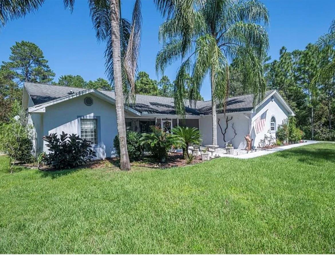WELCOME HOME TO PINE RIDGE EQUESTIAN COMMUNITY. One like no other! This is a beautiful 3 bedroom, 2bath, pool home with over 1600sf of living space along with a perfectly situated screed in pool area. This home displays Florida at it's finest with it's open concept, natural layout of land, all while providing access to some of Florida's best equestrian opportunities. Pine Ridge Estates offers an abundance of equestrian amenities, approx. 50 miles of scenic riding trails and one of the largest equestrian centers in Citrus County. This home is for the lovers of the Florida scenery as well as the equestrian lover who desires the equestrian life inside such a desirable community. Host family and friends easily with the RV/Camper hookup already installed next to the main residence. The property has an array of fruit trees speckled throughout consisting of oranges, lemons, apples, and pears just to name a few! Don't miss the opportunity to see this home. It most certainly does not disappoint. New hot water heater and all new plumbing done 2025.