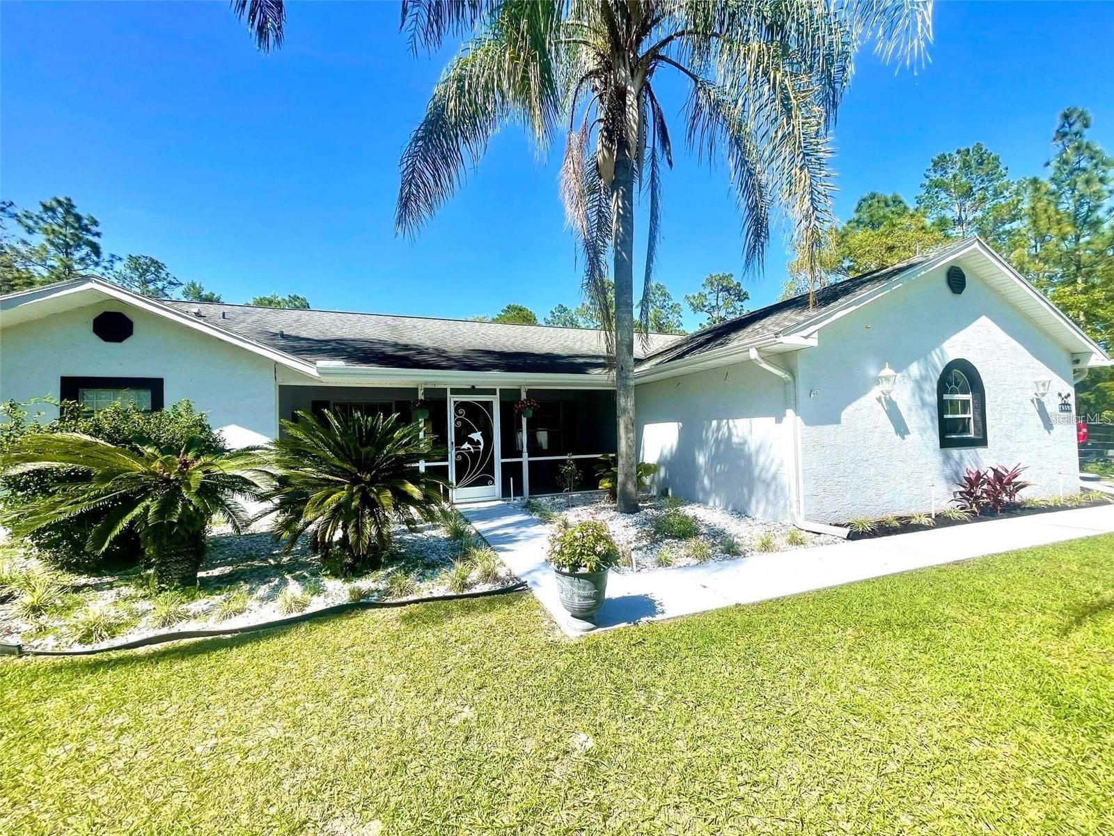 WELCOME HOME TO PINE RIDGE EQUESTIAN COMMUNITY. One like no other! This is a beautiful 3 bedroom, 2bath, pool home with over 1600sf of living space along with a perfectly situated screed in pool area. This home displays Florida at it's finest with it's open concept, natural layout of land, all while providing access to some of Florida's best equestrian opportunities. Pine Ridge Estates offers an abundance of equestrian amenities, approx. 50 miles of scenic riding trails and one of the largest equestrian centers in Citrus County. This home is for the lovers of the Florida scenery as well as the equestrian lover who desires the equestrian life inside such a desirable community. Host family and friends easily with the RV/Camper hookup already installed next to the main residence. The property has an array of fruit trees speckled throughout consisting of oranges, lemons, apples, and pears just to name a few! Don't miss the opportunity to see this home. It most certainly does not disappoint. New hot water heater and all new plumbing done 2025.