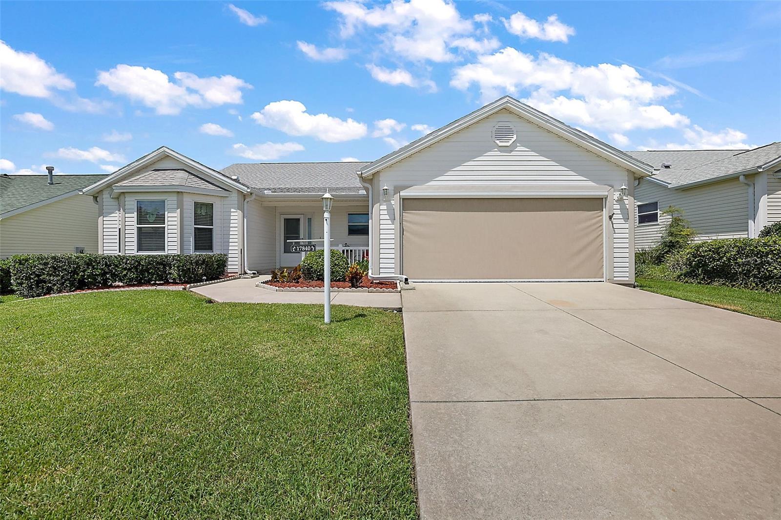 BACK ON THE MARKET! (No fault of seller!) Introducing an UPDATED Cypress model home in the VILLAGE OF PIEDMONT!  
ROOF 2021!     Upon entering this stunning home, you are greeted by an inviting foyer that flows into the expansive living area. Glance around to see LUXURY VINYL PLANK FLOORING throughout the kitchen, dining, and living areas. CONTEMPORARY LIGHT FIXTURES cannot help but grab your attention. 
To the left is the SPACIOUS and well-appointed kitchen, a delight with GORGEOUS QUARTZ COUNTERTOPS and AMPLE STORAGE space for all your culinary needs. The kitchen connects to the elegant dining area, making it an ideal setting for hosting memorable gatherings and entertaining guests. But not to be forgotten, the kitchen also hosts a large dinette with a grand BAY WINDOW, perfect for your morning coffee. 
Adjacent to the dining area, you'll find a large living room that welcomes you to relax and unwind. Natural light filters through the ceiling from a SOLAR TUBE, and patio doors open to an ENCLOSED LANAI, another place to unwind in this comfortable home. 
Your SPACIOUS MASTER BEDROOM is ready for you to bring your very own king-size bedroom suite. The Master Bedroom Ensuite boasts DUAL SINKS w/QUARTZ counters and a separate toilet/shower room.  There is PLENTY OF STORAGE with TWO large WALK-IN CLOSETS. 
 As you explore the remainder of this mostly TURNKEY home, you'll discover this Cypress model boasts a split floor plan containing two GENEROUSLY SIZED CLOSETED BEDROOMS, each offering comfort, and privacy for family members or guests. These rooms can be transformed into versatile spaces according to your unique needs, whether you envision a home office, a hobby room, or a cozy den.
The property's exterior is landscaped beautifully with a freshly mulched yard and has a covered front porch that is the perfect spot for your enjoyment: Sit with a cold glass of lemonade & wave to walkers passing by. HVAC 2013
This property benefits from its prime location! Residents can indulge in a plethora of amenities, including proximity to Mulberry, Chatham & First Responders Rec Centers, Savannah Center, dog parks, and endless areas for shopping and dining out.  Convenient location between the Nancy Lopez and Glenview Country Clubs (.8mi either way!)