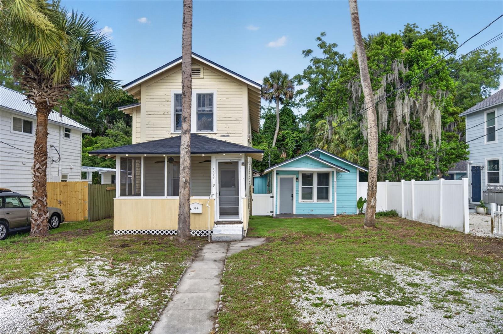 Discover a rare opportunity in the heart of historic downtown New Smyrna Beach. Ideally positioned between US-1 and the Indian River, 309 Rush Street offers two separate residences on one lot, creating flexible possibilities for multi-generational living, rental income, guest accommodations, or future investment use. Built in 1923, the property blends classic New Smyrna character with an unbeatable location just a short distance from Canal Street’s shops, restaurants, galleries, and local events.
The property features inviting outdoor spaces, off-street parking, and the charm of an established neighborhood close to the river, beaches, downtown amenities, and major roadways. Whether you are looking to expand your portfolio, live in one residence and rent the other, or reimagine a historic downtown property, 309 Rush Street delivers location, versatility, and long-term potential in one of New Smyrna Beach’s most desirable areas.
Opportunities like this are hard to find—schedule your showing today and explore the possibilities.
