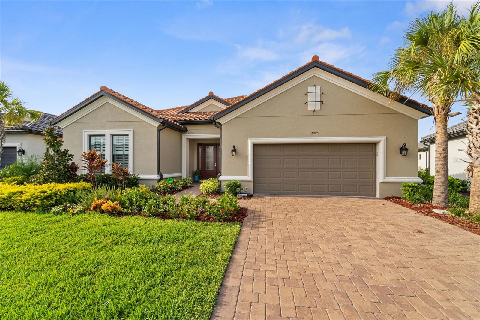 Introducing a Matchless Oasis in Starkey Ranch: Tailored to Discerning Tastes

Step into a realm where luxury intertwines seamlessly with nature's splendor. Nestled in the embrace of the esteemed Starkey Ranch community, a mere breath away from the Suncoast Parkway, this dwelling stands as a testament to the artistry of refined living.

Key Features:

The Pallazio Home Design

Unleash your creativity upon this open-concept masterpiece, a canvas of endless potential where every detail beckons the touch of your unique vision.

Versatile Room Configurations

With four bedrooms, a study, and spaces that shift with your desires, this abode caters to every whim and aspiration.

Inviting Common Area

Behold the great room, the gourmet kitchen, and the elegant dining space as they converge, forming a grand stage for life's most cherished moments.

Gourmet Kitchen

A culinary haven graced by a generous island, a bespoke veggie sink, and a pantry, with an option for a casual dining nook that invites the morning sun.

Primary Suite Retreat

Enter a sanctum of privacy, where options like a tray ceiling and bay window breathe serenity into the heart of your home.

Luxurious Bath

Dual sinks, a capacious shower, and a private water sanctuary create a spa-like haven, a respite from the world.

Guest Accommodations

Two guest chambers, each meticulously designed, one en-suite, ensuring unparalleled comfort for those who cross your threshold. The option for a fourth bedroom grants further versatility.

Seamless Indoor-Outdoor Living

Pocket sliding glass doors unfurl, revealing an expansive lanai, where a heated pool and spa await. Adjacent, a custom outdoor kitchen beckons, providing every amenity for al fresco dining under the sun's warm embrace.

Pond and Preserve Views

Embrace the serenity of nature, with views of the pond and the embrace of the lush preserve, a living canvas that shifts with the seasons.

Experience the quintessence of Florida living, where every nuance has been honed to perfection. From the heated pool and spa to the custom outdoor kitchen, this residence harmonizes sophistication with leisure. Discover modern luxury at its zenith in the heart of Starkey Ranch. Arrange your private tour and step into a world where dreams unfurl into reality.