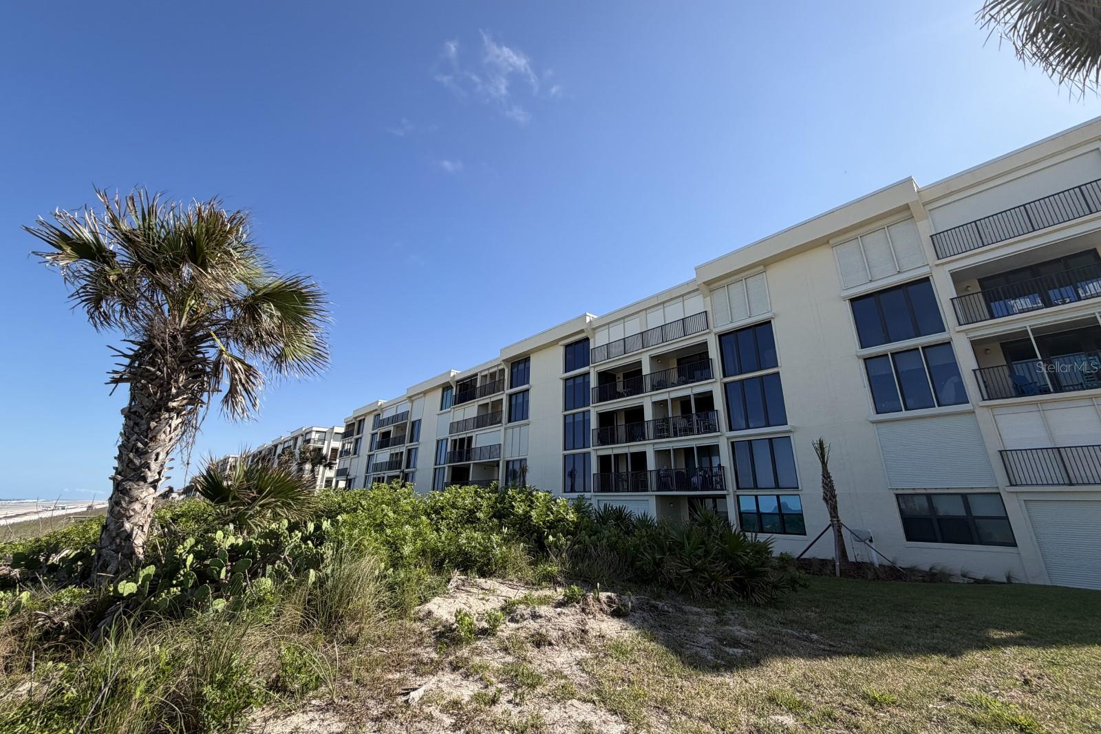Experience the best of coastal living in this beautifully maintained 3-bedroom, 2-bath condo located in the highly desirable Sand Dollar community of St. Augustine. Wake up to breathtaking ocean views from your private balcony and enjoy easy beach access just steps away. Enjoy an open and inviting layout designed for both everyday living and entertaining, and a  kitchen that gives you ocean views while you cook and gather with guests. This condo also features a private laundry room and comfortable coastal living spaces throughout. Residents enjoy resort-style amenities including a community pool and tennis courts. Being offered fully turnkey, this property is an excellent opportunity for an investment property, vacation rental, or your own personal beachside getaway. Conveniently located near historic downtown St. Augustine, dining, shopping, and local attractions, this is Florida coastal living at its finest!