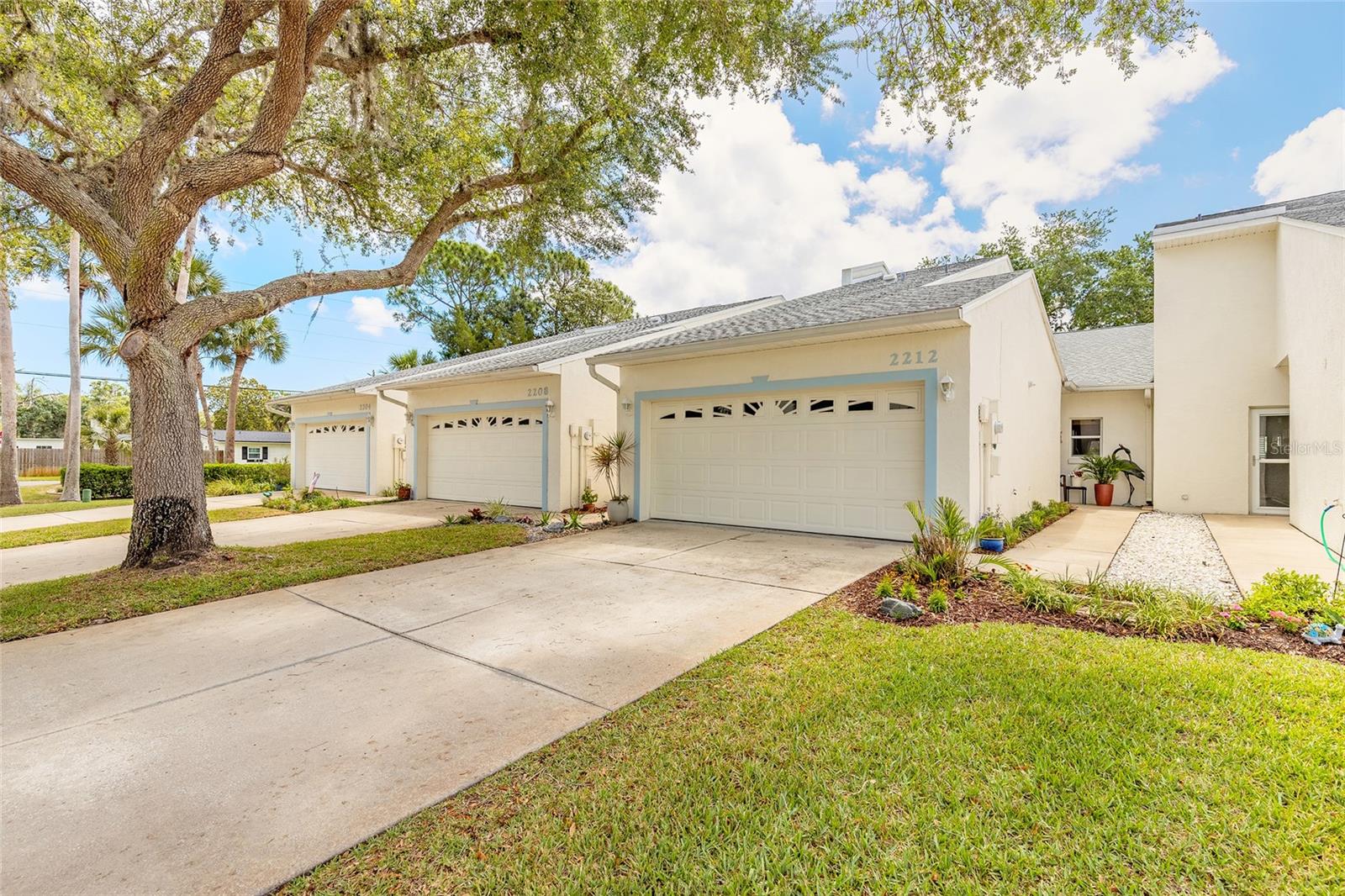 Enjoy the Florida lifestyle in this bright, open townhome just minutes from New Smyrna’s renowned beaches and close to shops and restaurants. Located in the popular Hidden Pines community, this home features 2 bedrooms, 2 baths plus a versatile bonus/flex room, vaulted ceilings with skylights, and an open floor plan that invites natural light throughout.

Convenient full two-car garage and low-maintenance living — HOA covers lawn & irrigation, exterior maintenance (including roof replacement), building insurance and termite bond. Hidden Pines amenities include a large pool with spa, clubhouse with kitchen and poolside patio, and lighted tennis/pickleball courts.

Perfect as a full-time residence, seasonal retreat, or investment — come see this charming New Smyrna Beach townhome and experience coastal living at its best.