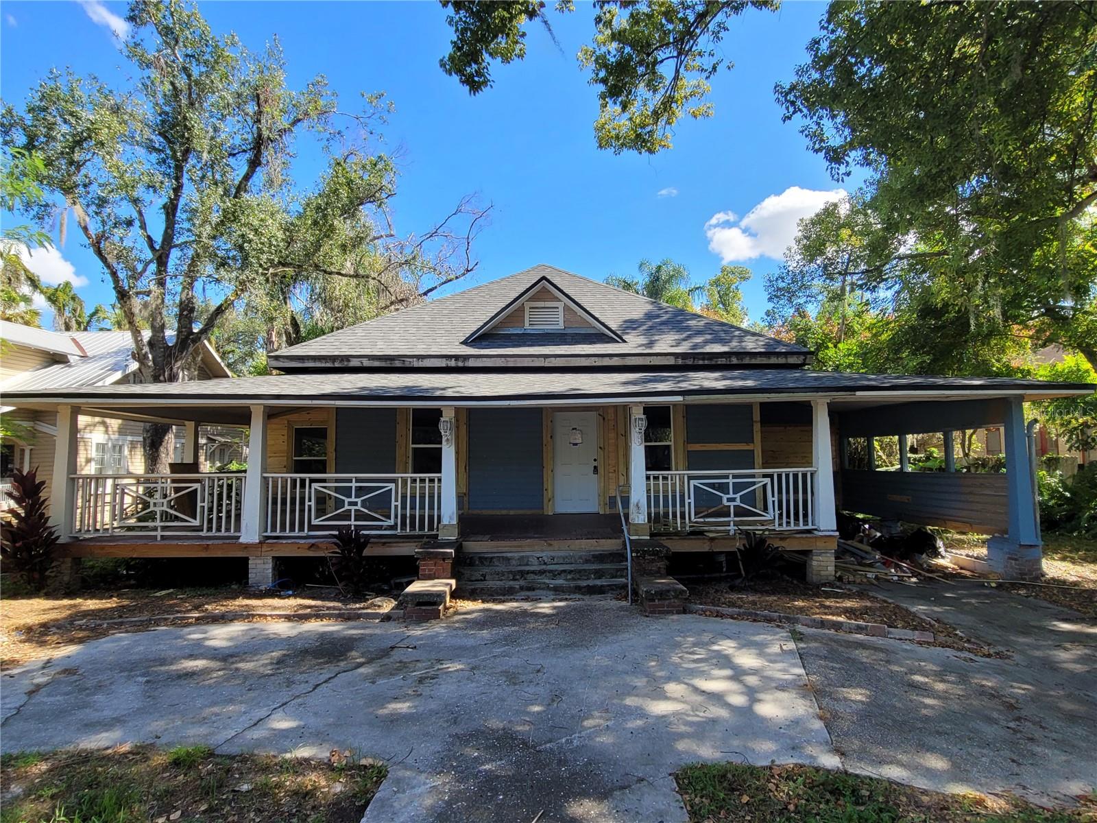 Investor's Dream Opportunity! Just needing the final personal touches! Come check out this Historic Arcadia home offering incredible potential with all the major renovations already completed. Blending timeless architectural charm with modern updates, this property is ready for its next owner to add their choice of exterior paint color and make it their own.

A sweeping front porch welcomes you into a spacious 3 Bedroom/ 3 Bathroom with seperate Denn or Office. The living room and formal dining room features a charming fireplace and all new flooring throughout. The newly remodeled kitchen boasts new cabinetry, granite countertops, and plenty of space for everyday living and entertainment.

Offering a flexible floor plan, this home features two spacious primary suites, providing excellent options for multi-generational living, guests, or private retreats. An additional office/den area could easily serve as a hobby room, or home office. The breakfast nook overlooks the backyard and connects to the inside laundry room for added convenience.

Major improvements have already been completed, including a new roof, new windows, new exterior siding, and the renovated kitchen, saving time and expense while preserving the home's historic character.

Outside, you'll find an attached carport plus an additional detached garage/workshop, perfect for storage, projects, possible mother in law suite or additional parking. City water and sewer service add to the home's convenience.

Located in the Historic District of Arcadia, you'll enjoy being just a few blocks from downtown's charming shops, restaurants, and antique stores. Known for its rich agricultural heritage, citrus groves, renowned rodeos, and the scenic Peace River, Arcadia offers a unique small-town lifestyle. Outdoor enthusiasts will appreciate nearby boat launches, fishing, and recreation, while Southwest Florida's beautiful Gulf beaches—including Englewood, Boca Grande, and Sanibel Island—are just a scenic drive away.

Don't miss this exceptional opportunity to own a piece of Arcadia history with the hard work already done and endless possibilities ahead.