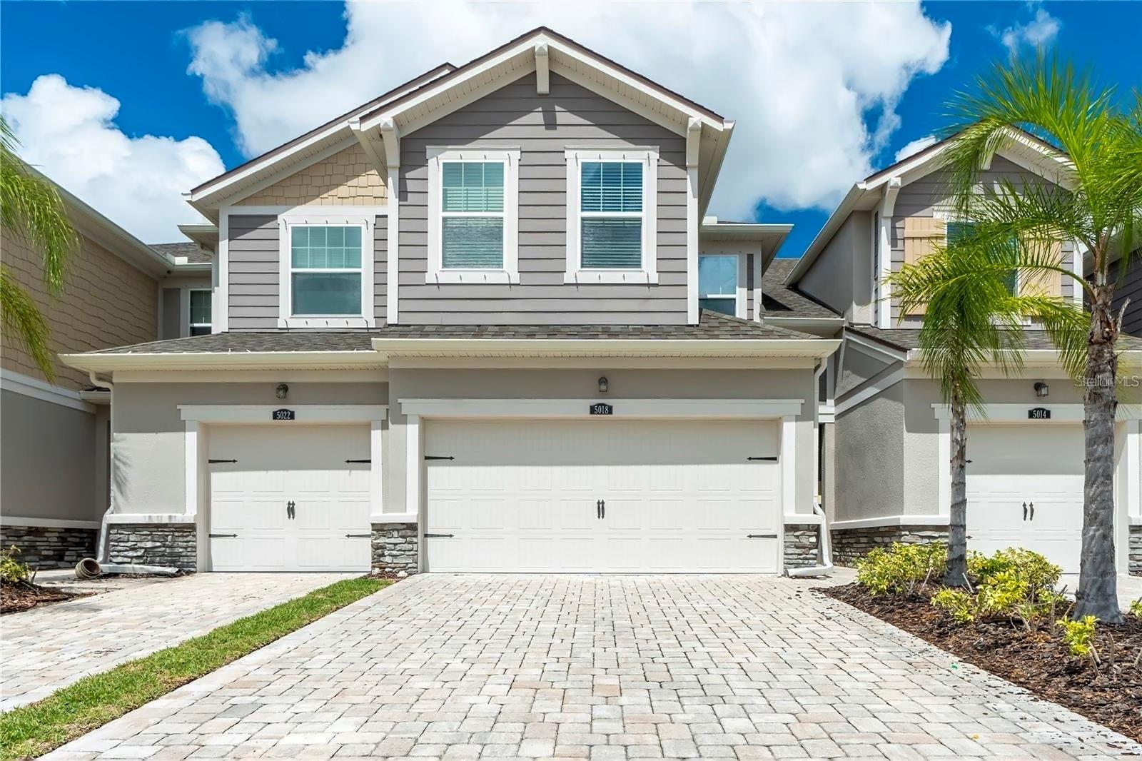 Short Sale. *SHORT SALE* Welcome home to this beautiful townhome at 5018 Sunnyside Ln in Bradenton, FL. This townhome offers 1,710 square feet of modern living space with 3 spacious bedrooms and 2.5 bathrooms. Recently upgraded with brand-new luxury vinyl floors throughout the entire upstairs, the interior feels fresh and inviting. The home boasts an open floor plan, ideal for both relaxation and entertaining. Enjoy serene lake views from the comfort of your living room or patio, offering a tranquil backdrop to your daily life. Additionally, the property includes a 2-car garage (includes newly epoxied garage floor), providing ample storage and convenience. Perfectly blending comfort and style, this townhome is located minutes from Lakewood Ranch Main Street and the UTC Mall for all your entertainment and needs! Owner is offering to continue paying for Home Warranty for new buyer until end of contract.