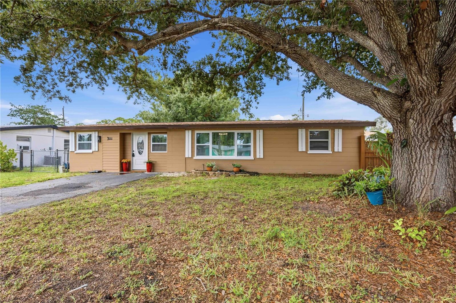Affordable Florida living just 5.9 miles (a quick 12 minute drive) from Englewood Beach! This charming 3 bedroom, 1 bath home offers 972 square feet of well-designed living space plus flexible bonus areas, including a dedicated study/den, giving you more usable space than the bedroom count suggests. Big-ticket updates are already done: BRAND NEW 2025 ROOF plus impact windows in the living room and kitchen. Inside you'll find an open floorplan with plank tile flooring throughout, an elevated kitchen with wood cabinets, updated lighting fixxtures and ceiling fans throughout, and a full appliance package including washer and dryer. The seller is including select furnishings: two reclining couches, two twin beds with mattresses, a bunk bed with mattress, and a TV stand, making this an easy move-in or turnkey rental opportunity. Outside, a gorgeous mature oak tree anchors the front yard, while the fully fenced backyard features a covered and screened rear porch and a storage shed for tools and toys. NO HOA, NO CDD, and NO minimum lease period, ideal for first-time buyers, seasonal residents, or investors seeking rental flexibility. City water and sewer, no well or septic to maintain. Minutes from Manasota Key, shopping, dining, and world-class fishing and boating. Cash, Conventional, FHA, and VA financing welcome. Schedule your private showing today!