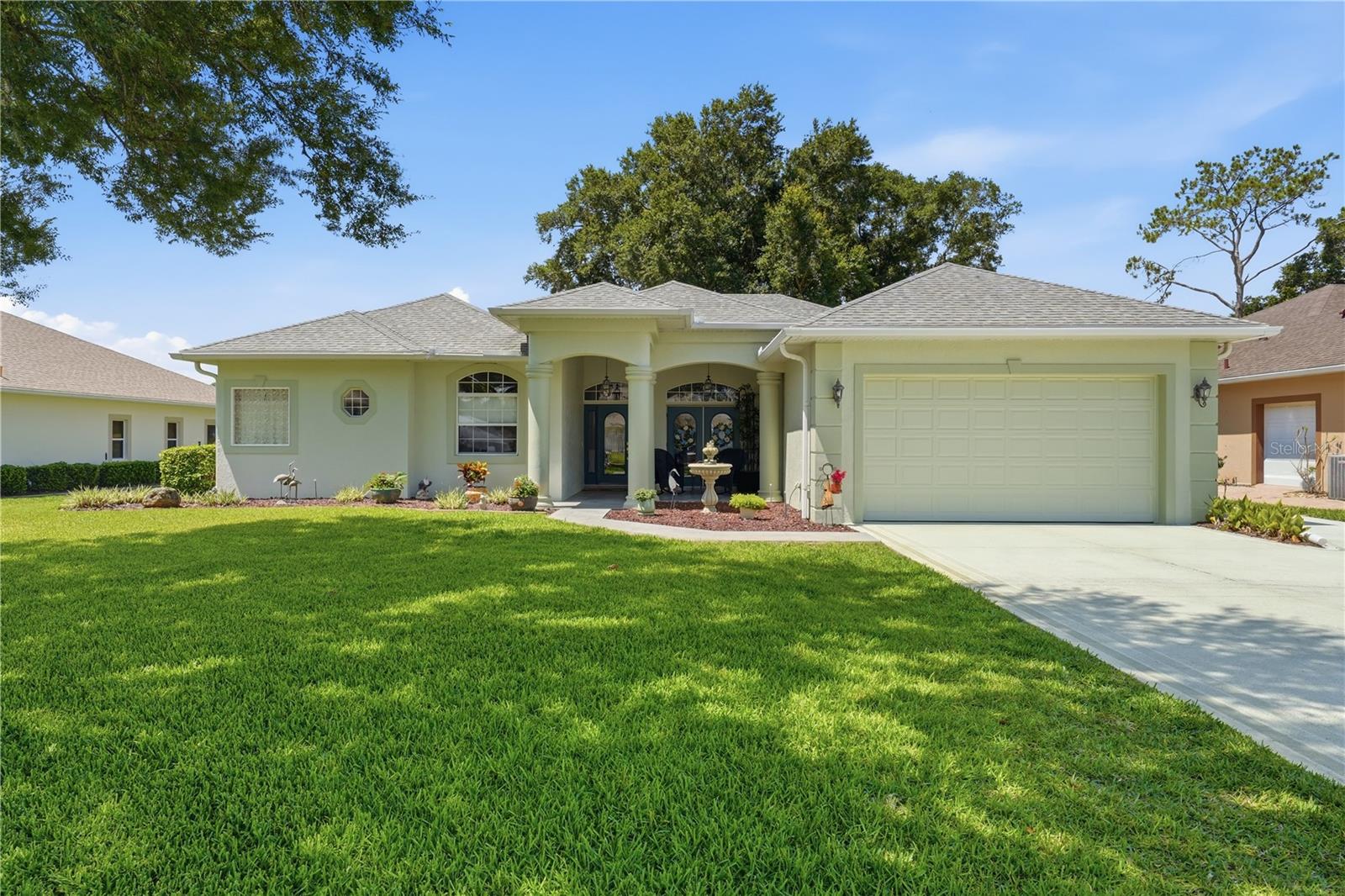 Harbor Hills golf course frontage - this beautiful home is a TEN out of TEN!!  
1. Roof replaced 2020
2. HVAC replace June 2025 - under service warranty with Munn's
3. Neutral tile flooring through out home
4. Large master suite, his-her walk in closets, cultured marble vanities with makeup counter
5. Split floor plan
6. Interior freshly painted July 2025, exterior painted 2024
7. Two full baths and one 1/2 guest bath
8. Flex room - currently used as den
9. Large two car garage with attic storage and separate golf cart garage
10. Sits on #2 tee of Harbor Hills golf course

Some additional features - new attic stairs installed, added cabinets in laundry room, new high rise toilets installed in both full baths, new fan installed in kitchen-breakfast area, kitchen upper and lower cabinet lights installed, pull outs in ALL lower kitchen cabinets.  The expansive covered lanai provides a perfect spot to relax and enjoy the serene golf course views.  Located in The Grove at Harbor Hills, this home offers a LOW HOA and NO CDD with optional membership for golf, tennis, fitness and access to the Chain of Lakes.  Tour today and don't miss the opportunity to make this delightful residence your own!  OWNER is LISTING AGENT.