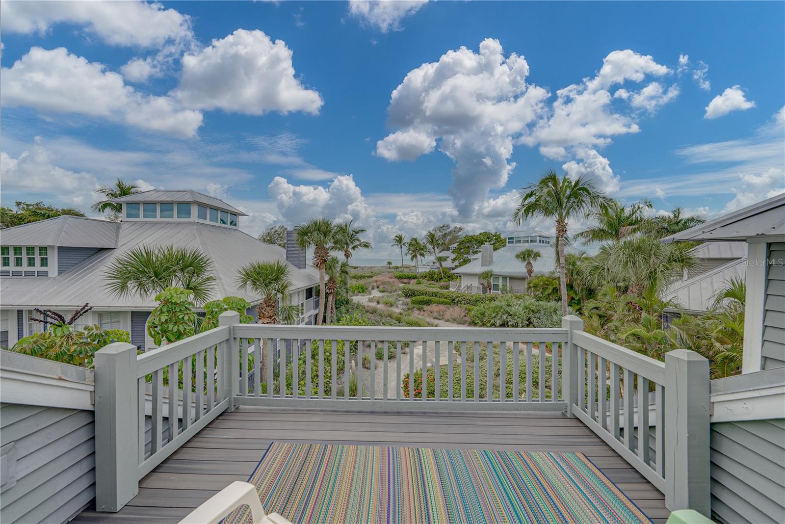 Peaceful and private, this spacious Gulf-view single-family home offers nearly 4,000 total square feet and an excellent opportunity to make this property your own. Featuring three bedrooms, three full baths, a versatile loft, charming cupola, and a convenient three-stop elevator, the layout provides both flexibility and functionality.

Set just back from the direct beachfront, the home still enjoys a pleasant Gulf view along with added privacy. The large glass-enclosed porch and open sundeck create inviting spaces to relax, entertain, and take in the coastal setting.

Located in the gated Seawatch community at the north end of Boca Grande, this property is just a short walk to the beach, known for the island’s best shelling.

Community amenities include two heated pools, tennis courts, walking paths, and boardwalk access to the beach—ideal for enjoying the laid-back island lifestyle and beautiful sunsets.