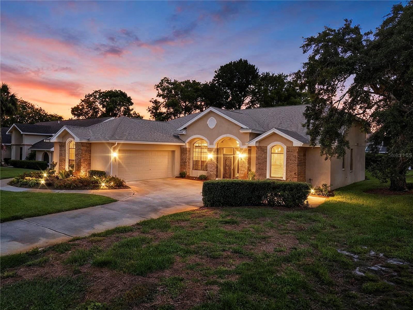 Welcome to Glen Lakes Golf & Country Club, where comfort, convenience, and an exceptional Florida lifestyle come together! This beautifully designed 2-bedroom, 2-full bathroom home features a desirable split-bedroom floor plan designed for both comfort and privacy. Step inside to discover soaring ceilings, abundant natural light, and an inviting layout perfect for everyday living and entertaining. The spacious living room is highlighted by French glass doors across the room that open to a private screened lanai complete with an outdoor kitchen, creating the perfect indoor-outdoor Florida lifestyle. The large kitchen offers generous cabinet and counter space, a breakfast bar for casual dining, and overlooks a bright breakfast nook surrounded by beautiful windows with peaceful views of the professionally landscaped backyard. A separate private office/den features warm wood flooring, making it ideal for working from home, a hobby room, or a quiet reading retreat. provides plenty of space for family gatherings and special occasions. An inside laundry room, abundant storage, numerous closets, and additional cabinetry throughout the home provide convenience and functionality. Recent major updates provide peace of mind, including a new shingle roof (2022) and new HVAC system (2022). The exterior boasts outstanding curb appeal with professionally designed landscaping, a turn-around driveway, an oversized two-car garage, and a separate golf cart entrance. The private screened outdoor living area offers a tranquil setting to relax or entertain while enjoying Florida's beautiful weather. For added convenience, this home may be sold fully furnished, making it an excellent choice as either a full-time residence or seasonal retreat. Located within the beautiful Glen Lakes Golf & Country Club, residents enjoy a 24-hour guard-gated community surrounding a private 18-hole championship golf course. No social membership is required, and the community features a low HOA fee that includes cable television and high-speed internet. Optional golf and social memberships provide access to championship golf, tennis, pickleball, a fitness center, dining, and a vibrant calendar of clubs and social activities. Conveniently located just minutes from Pine Island Beach, approximately 45 minutes from Tampa International Airport, and close to Florida's beautiful Gulf Coast beaches, this exceptional home offers the perfect combination of luxury, privacy, and carefree living. Don't miss this rare opportunity to own a beautiful home in one of Hernando County's most sought-after communities. Schedule your private showing today and experience everything Glen Lakes! Home is priced below comps don't wait this won't last!!