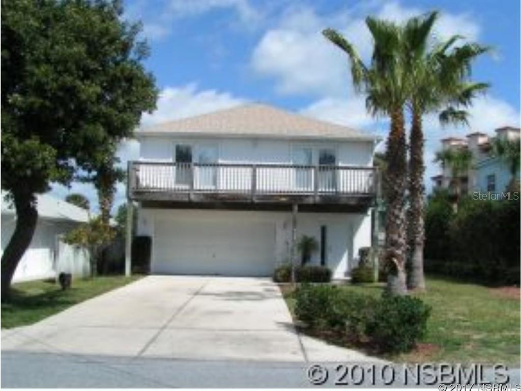 Location, location - just a few steps to the ocean.  Three bedroom 2 bath with large master bedroom, wet bar and french doors leading to the patio.  Open floor plan with living room dining room combo, cathedral ceilings and large balcony off the second floor ;Water: City