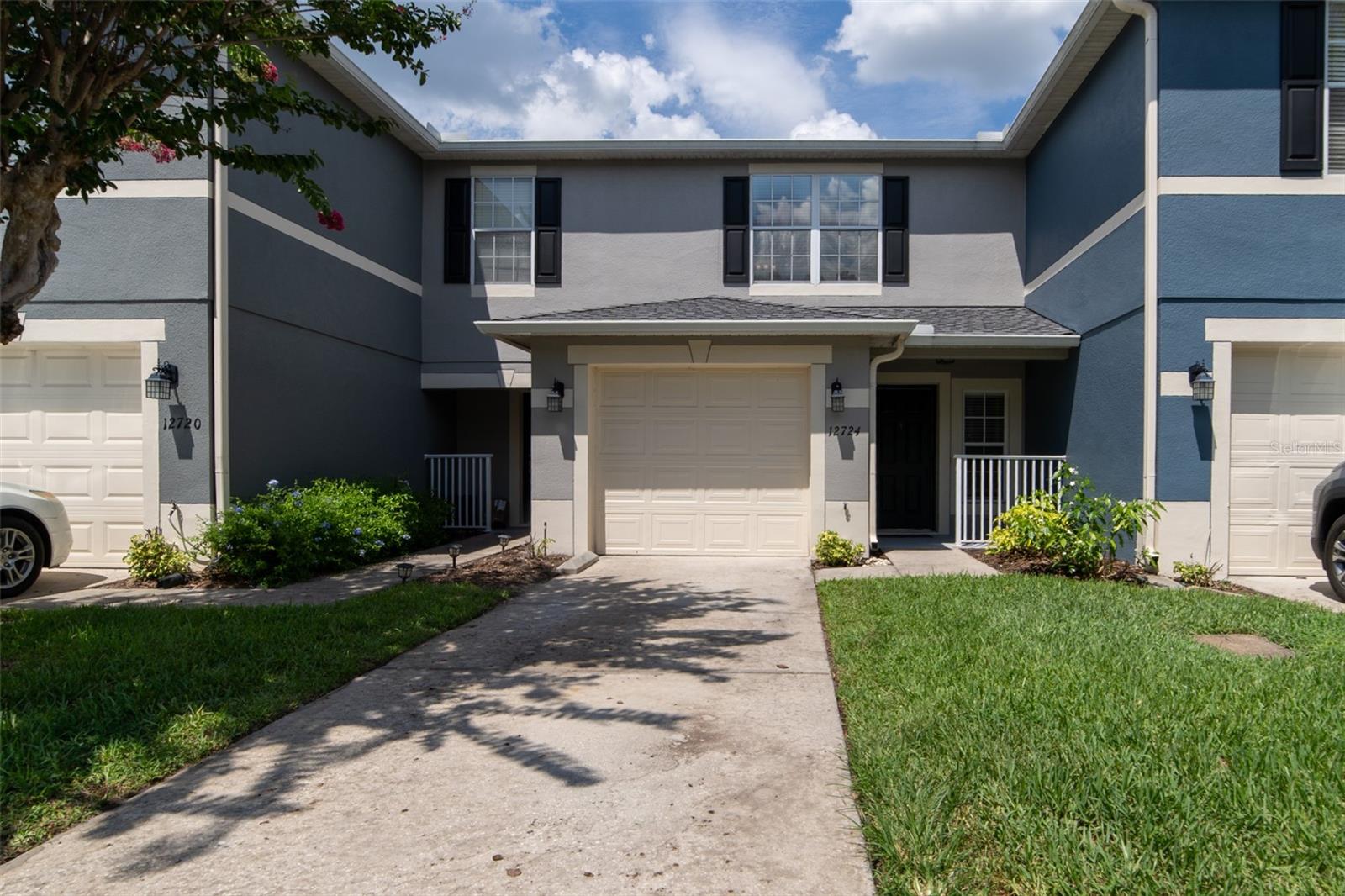 Virtually Staged. Welcome to 12724 Lexington Summit Drive — Your Sanctuary in the Heart of East Orlando!
Situated inside a gated community in one of Orlando's most sought-after zip codes, this charming 2-bedroom, 2.5-bath townhome offers the perfect blend of comfort, convenience, and value — all at $298,000.
This well-maintained home features low-maintenance laminate and tile flooring throughout — no carpet to worry about! The functional two-story layout provides an open living area on the main floor and comfortable bedrooms upstairs, with a 1-car garage rounding out the package.
Location is where this home truly shines:

Minutes from the University of Central Florida (UCF) — ideal for faculty, staff, or investors
Steps from Waterford Lakes Town Center, with over 100 shops, dining, and a movie theater
Easy access to SR-408, SR-417, and the 528 — making your commute effortless
Just 15 minutes to Downtown Orlando and about 30 minutes to Cocoa Beach
Near Valencia College, top-rated Orange County schools, and multiple healthcare facilities

Whether you're a first-time buyer, a UCF-area investor, or someone who wants resort-style living with real-world access, this townhome checks all the boxes. The gated community also offers a swimming pool and playground for residents to enjoy.
Don't miss your opportunity to own in one of East Orlando's most connected communities. Schedule your showing today!