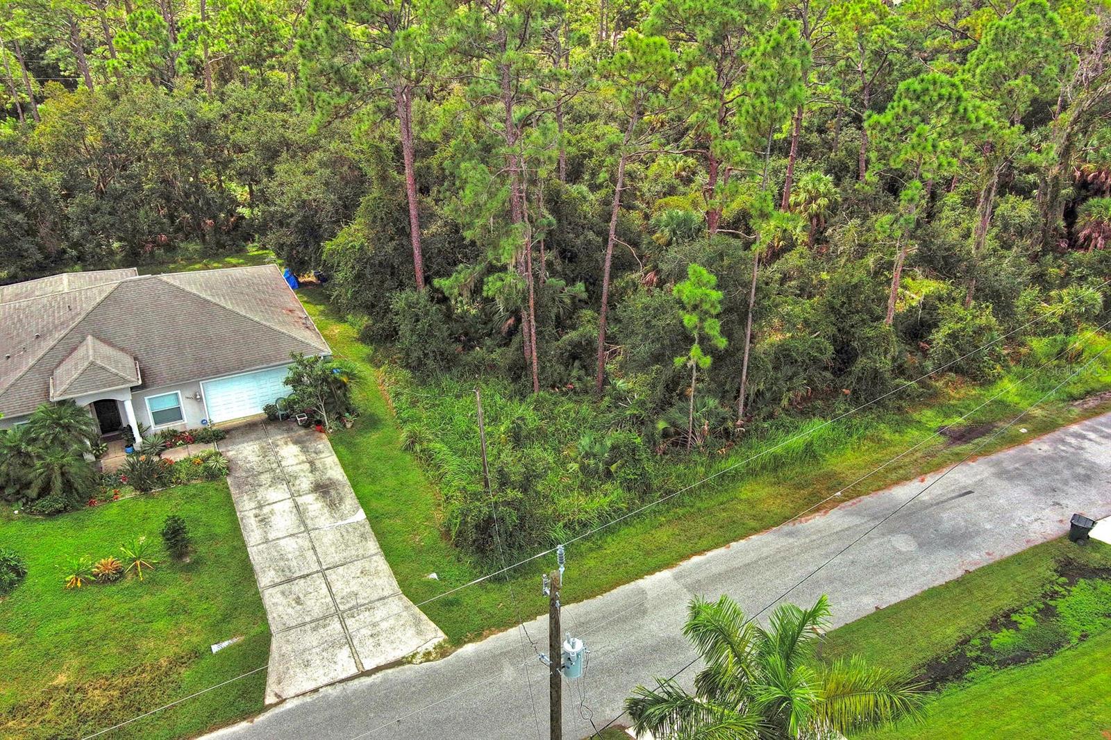 This centrally located 0.23-acre lot in North Port, Florida, is high and dry with no flood zone. A well developed neighborhood that is conveniently close to I-75 and major roads, it offers the perfect location for your next home. North Port, FL is a rapidly growing city known for its family-friendly atmosphere, proximity to Gulf Coast beaches, and easy access to both Sarasota and Fort Myers. The city also offers a variety of outdoor recreational activities, including hiking, golfing, and access to Warm Mineral Springs.