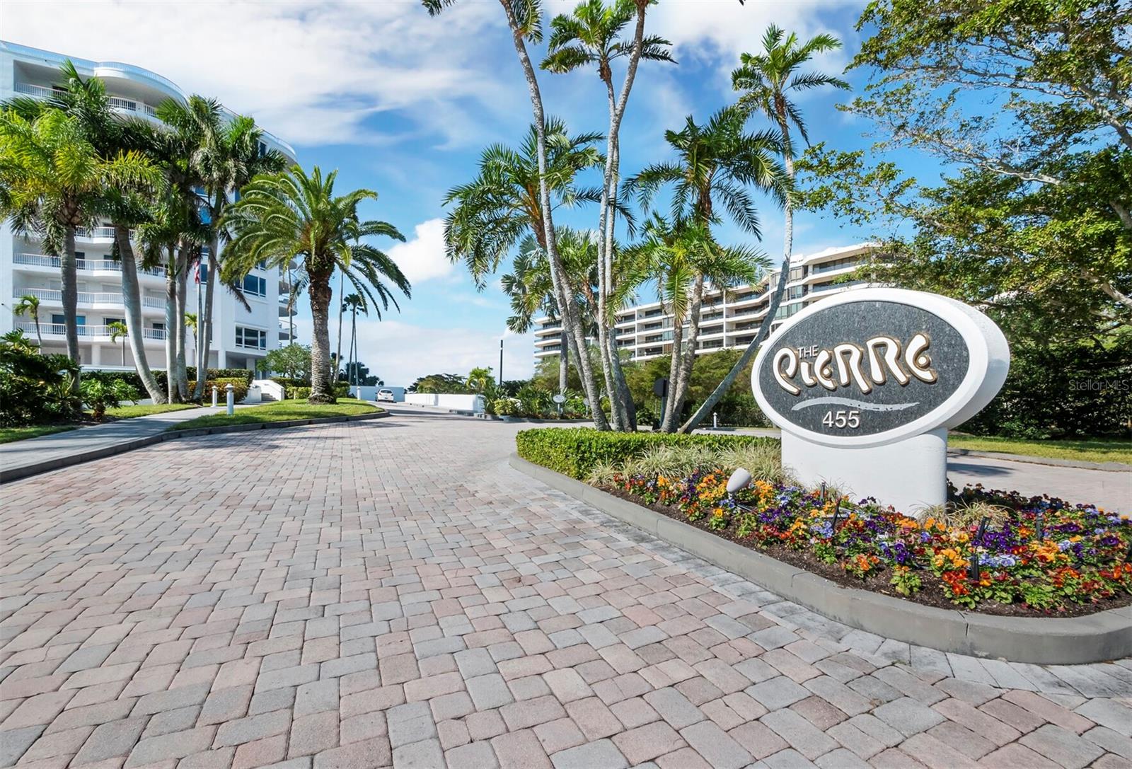 PENTHOUSE LIVING AT THE PIERRE – LUXURY GULF-FRONT RESIDENCE IN LONGBOAT KEY CLUB

Welcome to The Pierre, an exclusive Gulf-front community featuring just 66 luxury residences nestled behind the private gates of the renowned Longboat Key Club. This beautifully renovated eighth-floor penthouse residence offers breathtaking panoramic views from every room, showcasing the tranquil bay waters, spectacular Gulf sunsets, and the sparkling city skyline.

Designed to maximize natural light and capture the beauty of its surroundings, expansive windows frame unforgettable vistas throughout the home. Thoughtfully crafted for both everyday living and elegant entertaining, this exceptional residence features three spacious bedrooms, three-and-a-half baths, and a gourmet kitchen equipped with premium Thermador appliances, abundant cabinetry, and generous workspace for the discerning chef.

The luxurious primary suite provides a peaceful retreat with stunning water views, while the additional guest suites allows for comfort and privacy for family and visitors.

Residents of The Pierre enjoy an impressive collection of resort-style amenities, including:

• Direct private beach access
• Beachfront heated pool and spa
• Fitness center
• Tennis courts
• Newly renovated lobby and common areas
• Club gathering room and meeting facilities
• 24-hour guarded security
• On-site professional management

Ownership also includes two private garage parking spaces, a secured storage area, and access to private guest suites available for visiting family and friends on a nominal rental basis.

For those seeking an elevated lifestyle, membership opportunities at the renowned Longboat Key Club provide access to championship golf courses, world-class tennis facilities, spa and wellness services, exceptional dining venues, beach services, and a vibrant social calendar (membership subject to application and availability).

Ideally located near St. Armands Circle and vibrant Sarasota, you'll enjoy convenient access to fine dining, boutique shopping, arts and cultural attractions, and some of Florida's most beautiful beaches.

This is a rare opportunity to own an extraordinary Gulf-front penthouse in one of Longboat Key's most sought-after luxury communities. Schedule your private showing today and experience the unparalleled lifestyle that awaits at The Pierre.
