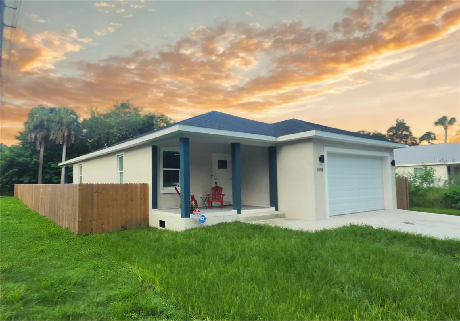 Near downtown New Port Richey, just a few blocks from the gorgeous Cottee River and the beautiful Simms Park and many more attractions.  No HOA and no CDD!  The house welcomes you with a spacious front porch with high ceiling entry door.  The well-designed floor plan is unlimited for your decor ideas.  The kitchen has beautiful granite countertops, stainless steal appliances and solid wood cabinets.  The entire house has NEW vinyl floor!  NEW A/C unit.  The primary bedroom has a large master bathroom with double vanity sink with quartz countertops.  All windows and doors are hurricane resistance.  The property has a security system all around the house, lights and cameras plus a ring tone.  This is a wonderful house that awaits its new owner!