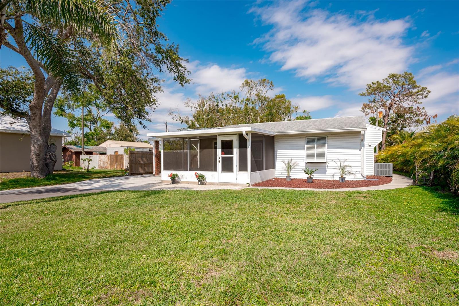 Welcome to this cute 2 bedroom/1 bath home located in a quiet South Venice neighborhood! This charming residence boasts a cozy living area upon entry and completely updated bathroom. Bonus den/flex room can be used as a 3rd bedroom! Granite countertops enhance the kitchen as well as lighted shelving and under cabinet lighting. Large Florida room can be utilized for dining or entertainment. Step outside to your private backyard oasis, where you'll find a fenced in yard and a refreshing pool and plenty of room on the oversized lot to enjoy outdoor activities, gardening, or RV/Boat Parking. Roof replaced in 2019, new carport 2023, new fence, 2022, new water treatment system 2023. Brand new septic system installed June 2025. Minutes from shopping, beaches, schools, golf and more! Whether you're looking for a seasonal getaway or a full-time residence, this property is a great investment! Don’t miss out on the opportunity to make this your new home!