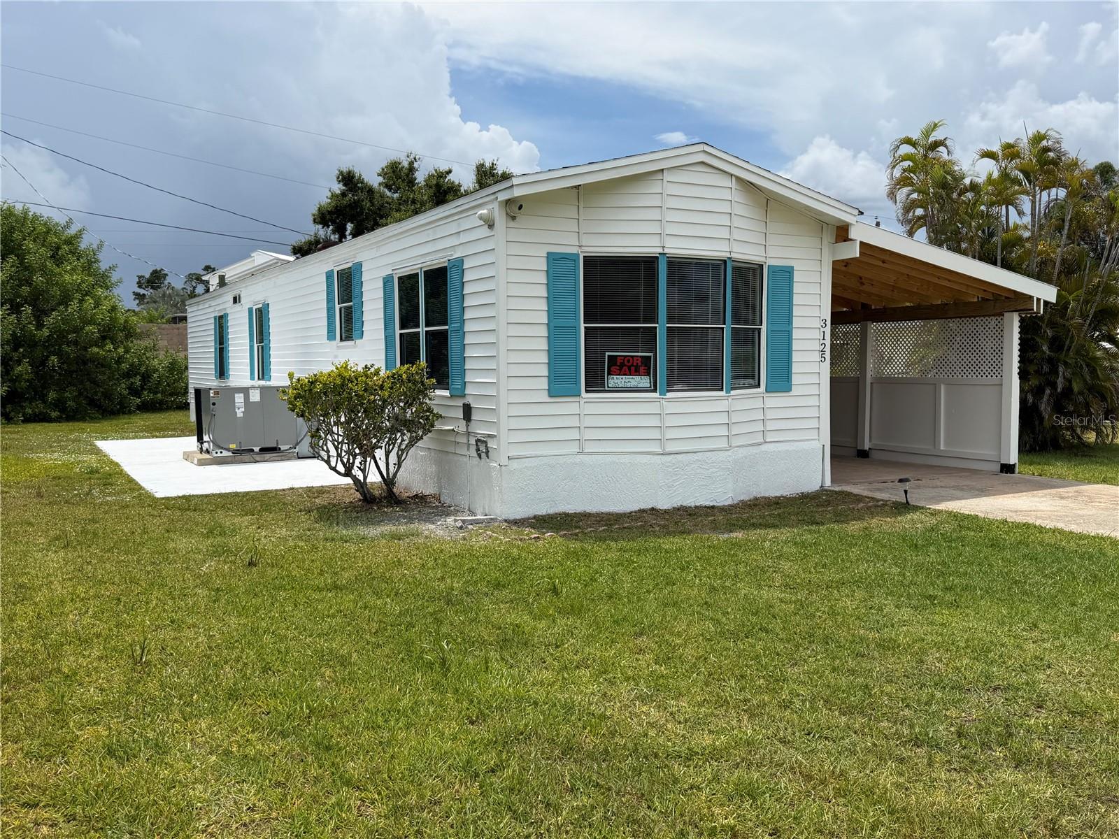 Completely renovated 2-bedroom, 2-bath home that is truly move-in ready and offers the look, feel, and peace of mind of a much newer home without the premium price tag. Situated on a spacious lot, you will enjoy something that is becoming harder to find, no lot rent and no HOA, because you own both the home and the land. Every major improvement has already been completed with quality craftsmanship and modern finishes, so all you have to do is move in and enjoy. This home features a brand-new 2.5-ton central A/C system with electric heat pump, new PEX plumbing throughout, an updated roof, new lighting and ceiling fans, and a generator-ready electrical system with generator included. Inside you will find granite countertops, all new kitchen cabinetry, a stainless steel appliance package, and luxury vinyl plank and ceramic tile flooring throughout. The spacious primary suite offers a private bathroom and a large walk-in closet, all finished with fresh, modern designer paint colors. The home sits on a solid concrete foundation with an attractive stucco finish and offers plenty of outdoor space for boats, trailers, RV parking, or future landscaping. The location cannot be beat, close to shopping, restaurants, marinas, boating, fishing, parks, and everything Punta Gorda has to offer. The expensive work has already been done for you, giving you a beautifully renovated home on your own land in one of Punta Gorda's most desirable locations. Seller financing available for a minimum of $50,000 down and flexible terms for qualified buyers. Call or message today to schedule your private showing.