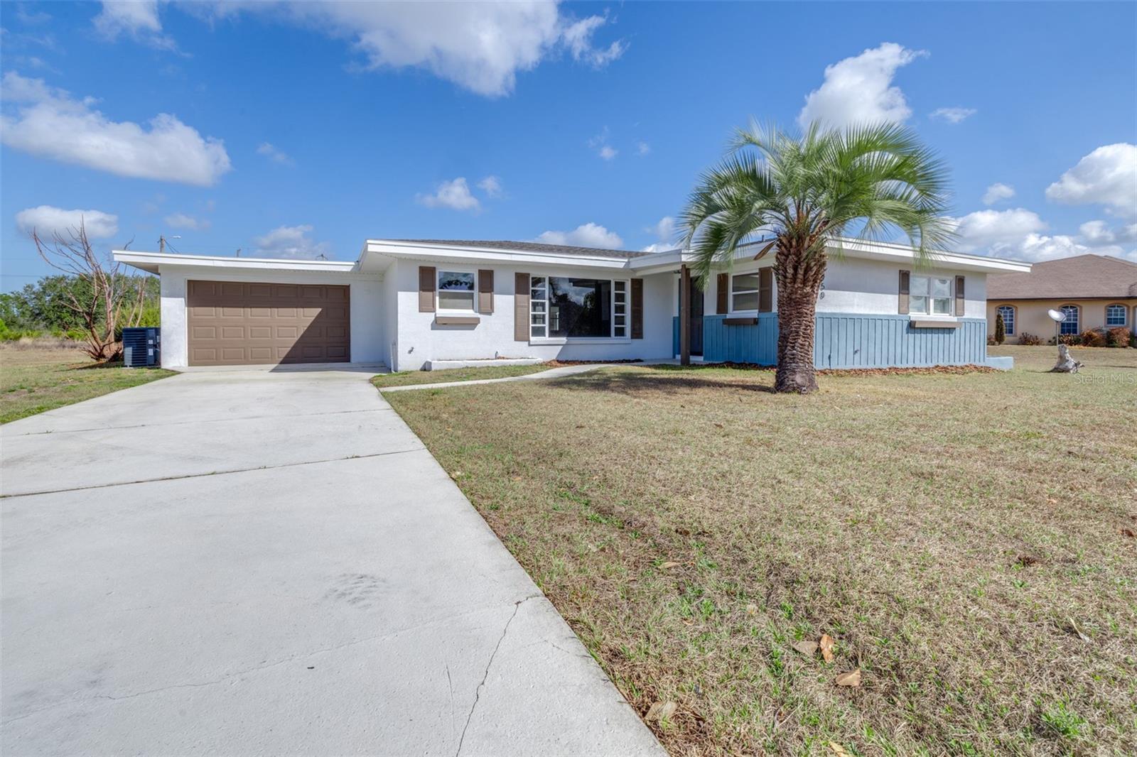 Florida country living lifestyle buyers are searching for, offering privacy, space, and resort-style amenities all in one. Welcome to this gorgeously renovated pool home on a half-acre in the sought-after community of Indian Lake Estates, located just east of Lake Wales in Polk County. This move-in ready home blends rural tranquility with neighborhood conveniences, making it ideal for buyers searching for acreage, pool homes with land, or fully updated homes near Lake Weohyakapka. Inside, nearly everything is brand new, giving the feel of new construction without the wait. Updates include waterproof laminate flooring throughout, fresh interior paint, new baseboards, updated electrical, and modern lighting. The fully renovated bathrooms feature new slow-close vanities, new faucets and toilets, custom tile showers, a double vanity in the main bath, and a beautiful walk-in shower in the primary suite. The heart of the home is the completely remodeled kitchen, designed for both entertaining and everyday living, showcasing real wood slow-close cabinetry, quartz countertops, crown molding, stainless steel appliances, an island cooktop, large pantry, and additional broom storage. The kitchen opens seamlessly into the living and dining areas, highlighted by a giant picture window overlooking the pool and filling the space with natural light. The open floor plan offers flexible living, including a den or guest room with French glass doors and pool views, plus a private office or fourth bedroom split from the others for added privacy. The spacious primary suite includes a renovated en-suite bath, and the indoor laundry room adds everyday convenience, while the garage entry is positioned perfectly for easy grocery unloading. Step outside to enjoy the resurfaced, natural-shaped pool with serene teal water, surrounded by expansive yard space and a storage shed, all set on a generous half-acre lot that provides both privacy and room to breathe. Ownership includes access to Lake Weohyakapka, also known as Lake Walk-In-Water, a 7,528-acre freshwater lake famous for trophy largemouth bass fishing and considered an angler’s paradise. Community amenities include lake access, boat storage options, golf course discounts, an on-site restaurant overlooking the ninth hole, and the longest freshwater fishing pier in Florida, delivering a true resort-style lifestyle in a peaceful country setting. Conveniently located within driving distance to Lake Wales shopping and dining, this fully renovated acreage pool home offers the perfect combination of modern upgrades, outdoor living, and Florida lake life — without the cost or delays of building new.