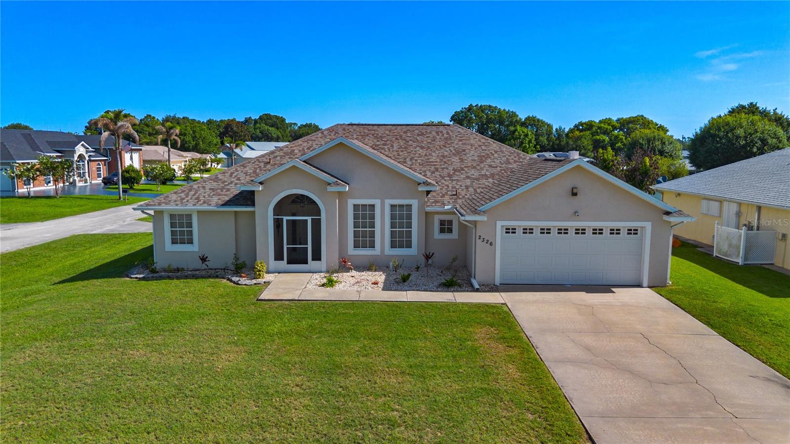 Welcome to this beautifully maintained 4-bedroom, 2-bath home offering approximately 2,200 sq. ft. of comfortable living space in the desirable Pine & Lake Estates community. This property features a newer roof (2022) and has been thoughtfully cared for, providing a move-in-ready experience for its next owner. Enjoy deeded access (for a very low $10/month HOA fee) to Lake Jackson with a sandy beach and private dock—perfect for boating, fishing, swimming, and taking in stunning Florida sunrises and sunsets. Inside, the home features an open floor plan with cathedral ceilings, neutral tile flooring, elegant lighting, and an upgraded kitchen with granite countertops, rich wood cabinetry, stainless steel appliances, and stylish backsplash. The primary suite includes two walk-in closets, a double sink vanity, a glass enclosed shower, and a soaking tub. A spacious enclosed sunroom with large sliding windows and dual ceiling fans is perfect for relaxing, entertaining guests, or providing year-round enjoyment.

Situated on an oversized 0.3-acre corner lot, this property offers a well-kept lawn, a two-car garage, and a detached, insulated, air-conditioned space ideal as a third-car garage, home gym, game room, or workshop. The community features quiet streets, mature landscaping, and is in close proximity to Lake Jackson, shopping, dining, schools, and everything Sebring boasts. 

This move in ready home combines comfort, style, and a prime location. Do not miss your chance to make it yours.