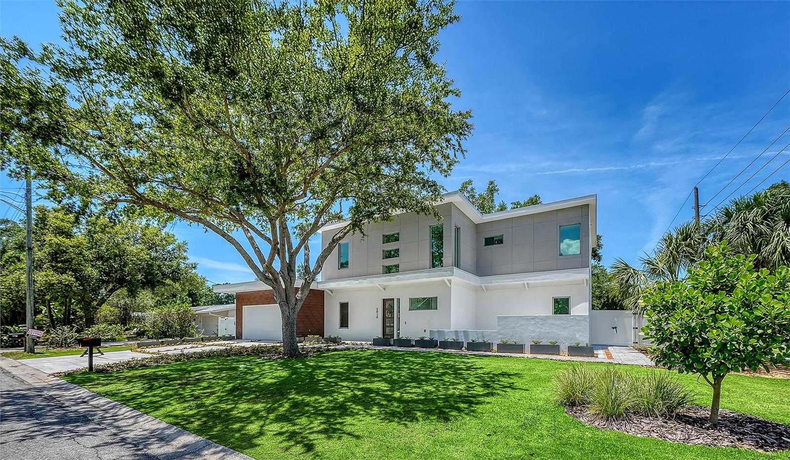 Best Value New Construction in Arlington Park. Positioned on a rare 10,200 sq. ft. corner lot in one of Sarasota's fastest-growing and most desirable neighborhoods, this newly constructed luxury residence offers an exceptional combination of location, privacy, functionality, and long-term value. Designed for modern living, the home features 3,515 square feet, 5 bedrooms, 5 full bathrooms, 1 half bath, and a private elevator connecting both levels. The thoughtfully designed floor plan offers expansive open living spaces filled with natural light, seamlessly blending indoor and outdoor living. The first floor showcases a luxurious primary suite, spacious gathering areas, and a versatile additional bedroom ideal for a home office, guest suite, or multigenerational living. The chef's kitchen serves as the heart of the home, opening effortlessly to the outdoor entertaining areas and resort-style pool. Upstairs, a second primary suite, three spacious guest bedrooms, and an oversized balcony create the perfect layout for families, seasonal residents, and guests. Two of the bedrooms enjoy direct balcony access, providing a private retreat to enjoy Sarasota's year-round sunshine. The backyard is a true extension of the home, offering a rare combination of privacy, green space, and functionality seldom found in new construction properties. Mature landscaping, a beautiful oak tree, a resort-style pool, and generous outdoor living areas create the ideal setting for entertaining, relaxing, or enjoying time with family and pets. The oversized two-car garage and extended driveway provide ample parking for both owners and guests. Arlington Park continues to attract buyers seeking newer construction, larger homesites, top-rated schools, and unmatched proximity to Sarasota Memorial Hospital, Southside Village, Downtown Sarasota, Siesta Key Beach, and Sarasota-Bradenton International Airport. Opportunities to own a newly constructed home on an oversized corner lot of this size are becoming increasingly rare. Whether you're searching for a primary residence, luxury second home, relocation property, or investment opportunity with strong rental potential, this exceptional home offers the lifestyle, flexibility, and location that define Sarasota living. Schedule your private showing today and discover one of Arlington Park's most compelling new construction opportunities.