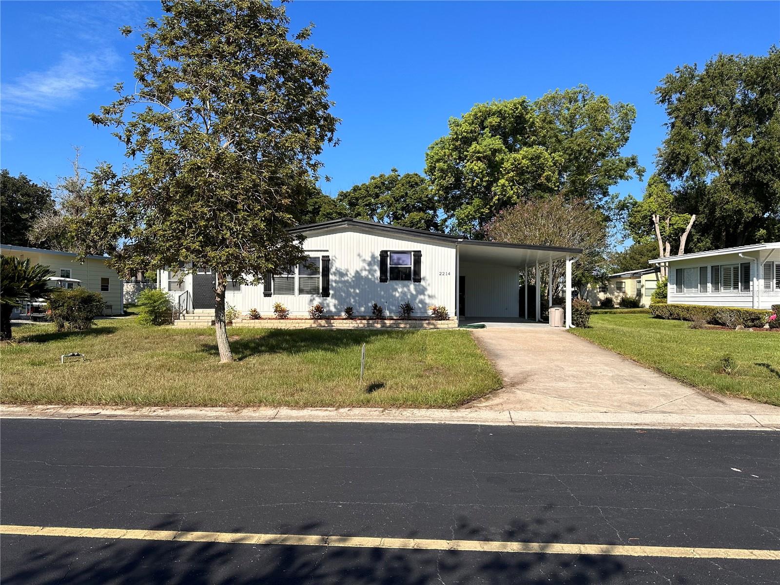 55+ Golf community, recently remodeled, all new 3/4" plywood sub-floors and laminate, All new stainless steel fridge, E. Range, Microwave, and dishwasher. Granite tops in kitchen and bathrooms, freshly painted inside and out, newer AC, Brand New Water heater, newer carport. INSIDE LAUNDRY ROOM Ample shed. REPLUBMING and replacing Vapor Barrier as of 10/13/2023.