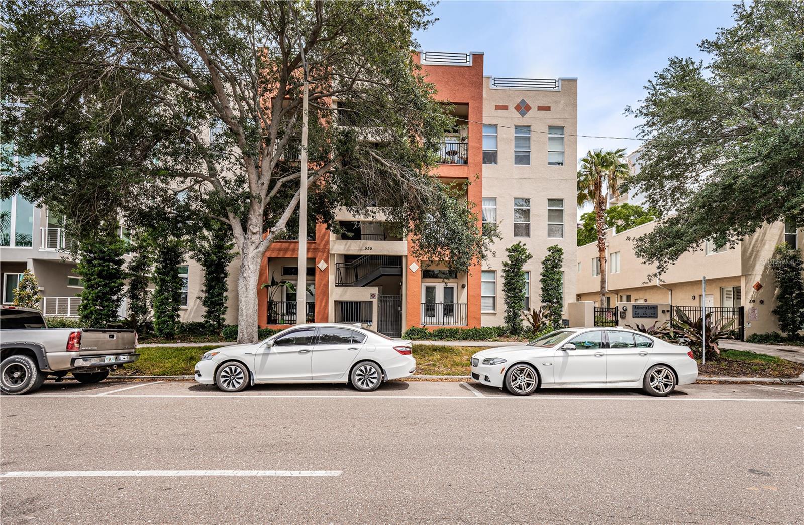 Welcome to your urban oasis in the heart of Downtown St. Petersburg! This captivating 2 bedroom, 2 bath condo nestled on the second floor offers a perfect blend of modern comfort and urban charm. As you step inside, prepare to be dazzled by the vibrant ambiance created by bamboo wood flooring, accentuated by the rustic elegance of red brick walls and exposed spiral ductwork. With soaring 11' ceilings, the space exudes a welcoming loft-style atmosphere, perfect for both relaxation and entertainment. The living area overlooks the sparkling pool, inviting you to unwind and enjoy the vibrant city views. Love to cook? Indulge your culinary passions in the stylish kitchen boasting a Kitchen Aid appliance package, complemented by designer granite countertops and stunning cabinetry, creating a culinary haven for every cooking enthusiast. Two spacious bedrooms provide peaceful retreats, each with ample closet space and natural light flooding through the windows. The two bathrooms provide convenience and luxury, featuring modern fixtures and finishes. Step outside to your private balcony, where you can savor your morning coffee or unwind with a glass of wine while enjoying the gentle breeze and cityscape views. Located in a prime downtown location, this condo offers unparalleled access to St. Petersburg's finest dining, entertainment, and cultural attractions. Whether you're strolling along the waterfront, exploring eclectic boutiques, or dining at world-class restaurants, the best of urban living is right at your doorstep. Don't miss your chance to make this exquisite condo your new home and experience the ultimate in downtown urban living. Schedule your showing today and make your dream lifestyle a reality!
