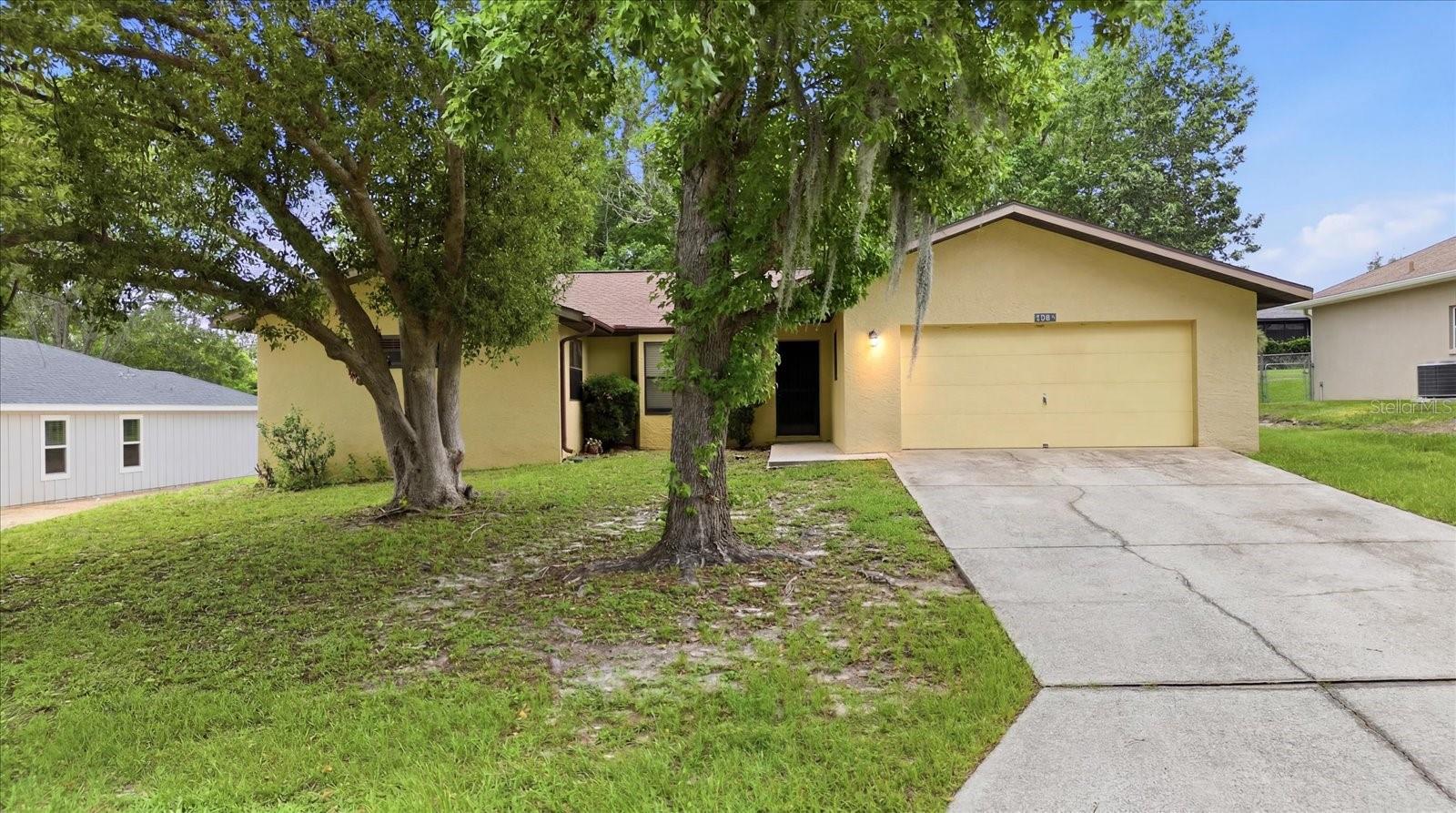 TERRIFIC OPPORTUNITY IN FLYING DUTCHMAN OF LECANTO WITH THIS 3 BEDROOM, 2 BATH, 2-CAR GARAGE HOME! If you know the Flying Dutchman homes of the late 80's early 90's, you know these homes were thoughtfully designed and solidly built, and this one is no exception. The floorplan maximizes every square foot (approximately 1856 sqft), delivering a massive common area and generously sized bedrooms that are hard to find at this price point. Step inside to a central living room with a sightline straight through to the screened lanai, creating that open, airy feel from the moment you walk in. The kitchen, dining, and family room flow together to the right, great for everyday living and entertaining alike. The bedrooms are to the left, giving the layout a natural separation of space, and ensuring privacy for the bedrooms. The Primary Suite is a true retreat, easily accommodating a king bed and full furniture set, with wall-to-wall closets, an en suite bath, and direct slider access to the lanai. Both guest rooms are equally impressive in size. The kitchen and baths are functional and clean, but here's the opportunity: the kitchen footprint is generous, with room to expand into the surrounding space if you want to go big, or simply refresh with new cabinets and countertops for an instant transformation. The bones are there, just bring your vision. And then there's the lanai! This screened outdoor space is the heart of the home for entertaining...accessible from three points including the living room and family room, with pass-through windows from the kitchen for easy hosting. Whether it's a quiet morning coffee or a full cookout, this space delivers. The practical stuff checks every box: Roof 2021; High & dry in Flood Zone X; Public water & sewer; Zoned for Forest Ridge Elementary, Lecanto Middle & Lecanto High; Centrally located, and just over a mile from the Lecanto 4 Corners with shopping, dining, and medical nearby; and with access to the Suncoast Parkway extension a few miles away, the Tampa Airport in just over an hour. This is a home with great bones, great space, and great potential. Come see it for yourself!
