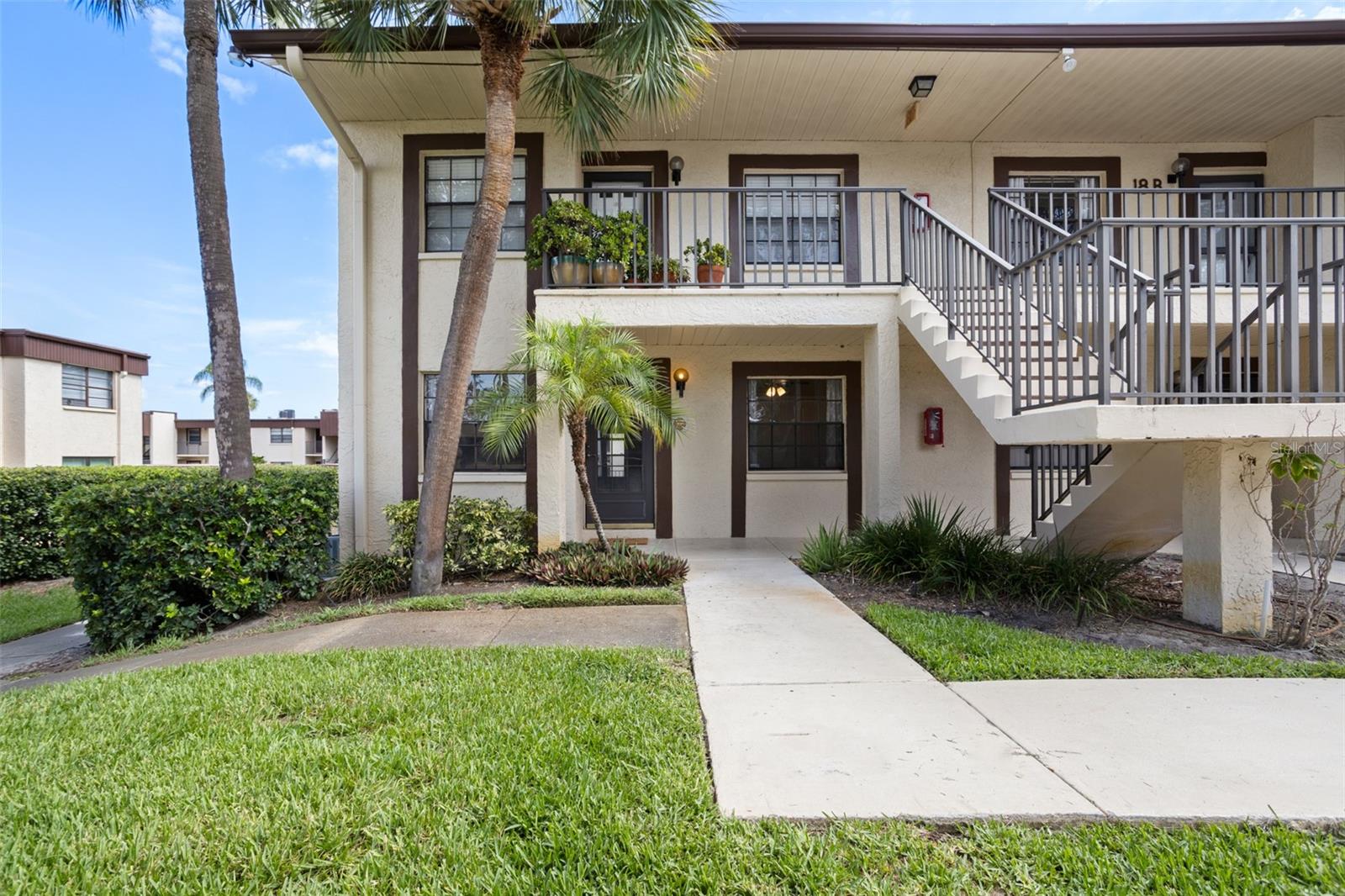 Located Just minutes to World Class Golf Courses, Venues for Concerts, Theater, Pro Sports, Hard Rock Casino, Museums, Water Sports, Marinas & Boat Docks, Fishing Piers, Nature Parks, Biking/Jogging Trails, Fine/Causal Cuisine, 2 Airports & the Award-Winning Beaches of the warm Gulf Of Mexico! Welcome to Winding Creek, one of Central Florida’s most popular locations….Clearwater’s Countryside! Imagine buying a spacious 2 Bedroom, 2 Bath Condo with NO CDD FEES, LOW HOA FEES and COMPLETELY RENOVATED in a Coastal Style at a truly AFFORDANBLE PRICE!!! NEVER affected by any Hurricanes, this Low Rise Building in FLOOD ZONE X is the way to go!  This is a Rare to Market, 1st FLOOR Unit that sits High & Dry and may just be the BEST location in this near Coastal Community! Southern Facing & STUNNINGLY DECORATED, this END UNIT should be the first one on your list of MUST SEES!  This Condo has a Great Open Layout designed for entertaining, yet the Eat-in Kitchen does provide privacy for preparing those delicious meals for your guests! It features SS Appliances, Coastal Shaker Style, Wood Cabinets & Granite Countertops. 2 Bedrooms are generously sized with the Primary having its own EnSuite. The Bathrooms have both been beautifully remodeled, as well. The Split Bedroom design is made for comfort when overnight visitors are there. You can relax in the All 4 Seasons Room or the Open Air Raised Outdoor Deck…your choice. Another must have?…..Be within steps off your back deck to the Heated Pool & Hot Tub, Saunas, Tennis & Shuffleboard Courts & a Picnic Area with Grills!!! Re-Roof 2023, HVAC 2025, WH 2024. All there is to say now is…..when are you going to come live this glorious Florida Lifestyle? It’s AFFORDABLE and it’s waiting for you!!!