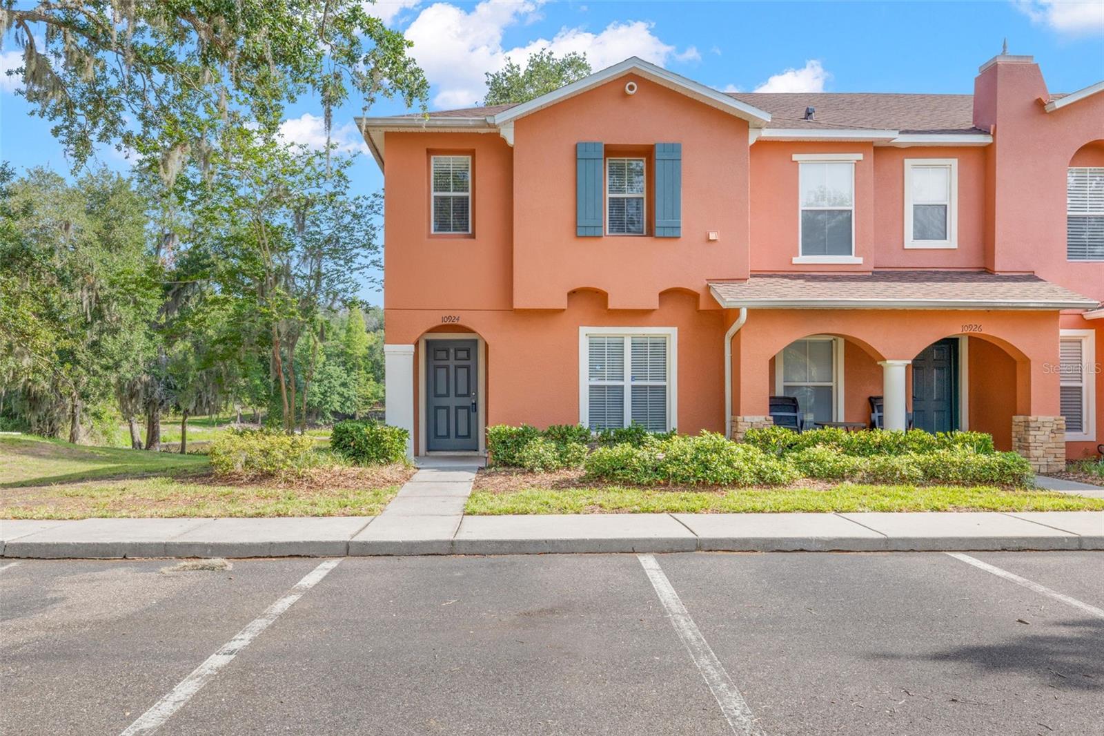Virtually Staged. Welcome home to this beautifully updated 3-bedroom, 2.5 bath end-unit townhome in the desirable St.Charles Place Townhomes community.  Conveniently located just off Hwy 301 & easy to get onto Hwy 75 to ease your commute.  Backing to a pond, this home features luxury vinyl wood-look flooring on the first level & plush gray carpeting upstairs.  The kitchen offers ample cabinetry, has gray-toned Formica countertops, stainless steel appliances, a closet pantry, space for a small table, & a large window that brings in natural light.  The kitchen opens up to the living & dining area creating a comfortable, open feel on the main floor.  Additional side windows provide even more natural light, & a convenient half bath is located on the first floor.  Upstairs, you will find all the bedrooms, two well appointed full baths, the laundry room, the HVAC closet, & the water heater closet for added convenience.  The HOA recently replaced the roof (2026) & painted the exterior (2025), giving the home a fresh, well-maintained look.  Just steps away from the community pool, this home has a lot that will please you.  With neutral paint throughout, this move in ready home is priced to sell --stop renting and make it yours!