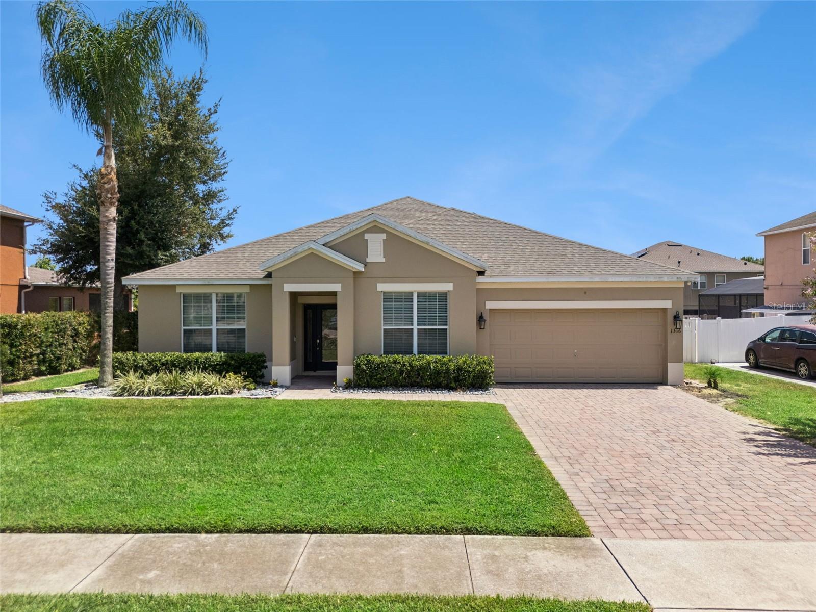 Welcome to 1316 Westmeath Court, a beautifully updated 4 bedroom, 2.5 bath home with approximately 2,515 square feet in a desirable gated Apopka community. From the moment you step inside, you will appreciate the bright, inviting layout, elegant crown molding, upgraded 5¼ inch baseboards, and stylish flooring throughout.

The spacious living and dining areas provides plenty of room for entertaining, while the refreshed powder room features charming shiplap, updated cabinetry, a new mirror, and coordinating hardware. The primary suite provides a comfortable retreat with generous space for relaxing and unwinding.

Enjoy added peace of mind with a new roof installed in January 2025 and a new indoor and outdoor HVAC system installed in April 2025. Additional improvements include updated flooring completed between 2025 and 2026, a screened lanai for outdoor enjoyment, and an alarm system installed in 2025.

The backyard was refreshed with new sod in 2026, creating a beautiful space for outdoor gatherings, play, or relaxation. The front landscaping has also been enhanced with new plants and Mexican beach pebbles, giving the home clean and welcoming curb appeal.

With thoughtful updates, spacious living areas, and major systems already replaced, this move in ready home offers the perfect combination of comfort, style, and value. Schedule your private showing and come see everything 1316 Westmeath Court has today for your HOME SWEET HOME!

buyer is responsible to verify all dimension and public records as to their due diligence.