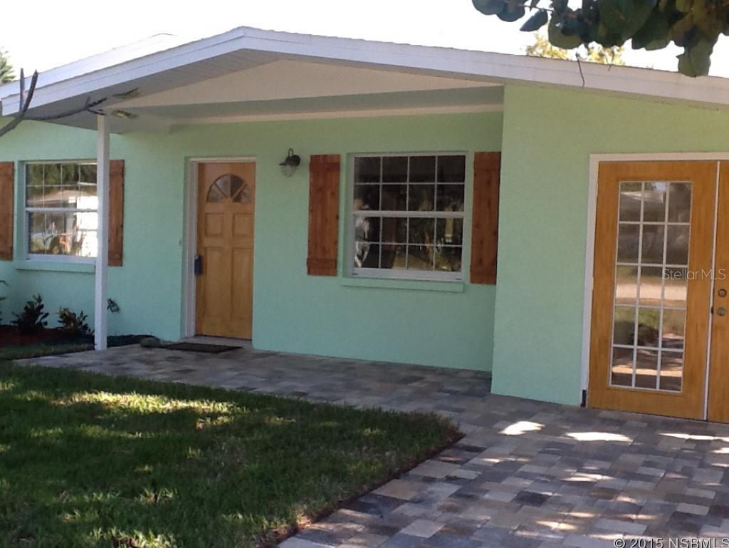 Beautifully updated 3/2 North Beach home. Beautiful open kitchen with all new wood cabinets, granite counter tops, stainless appliances, under cabinet lighting.  Absolutely beautiful terrazzo floors throughout.  New outside A/C, sunroom or office off of the living room, large laundry room, new pavers in the driveway, large lot.  Located on a quiet street walk to the beach or river. ;Water: City