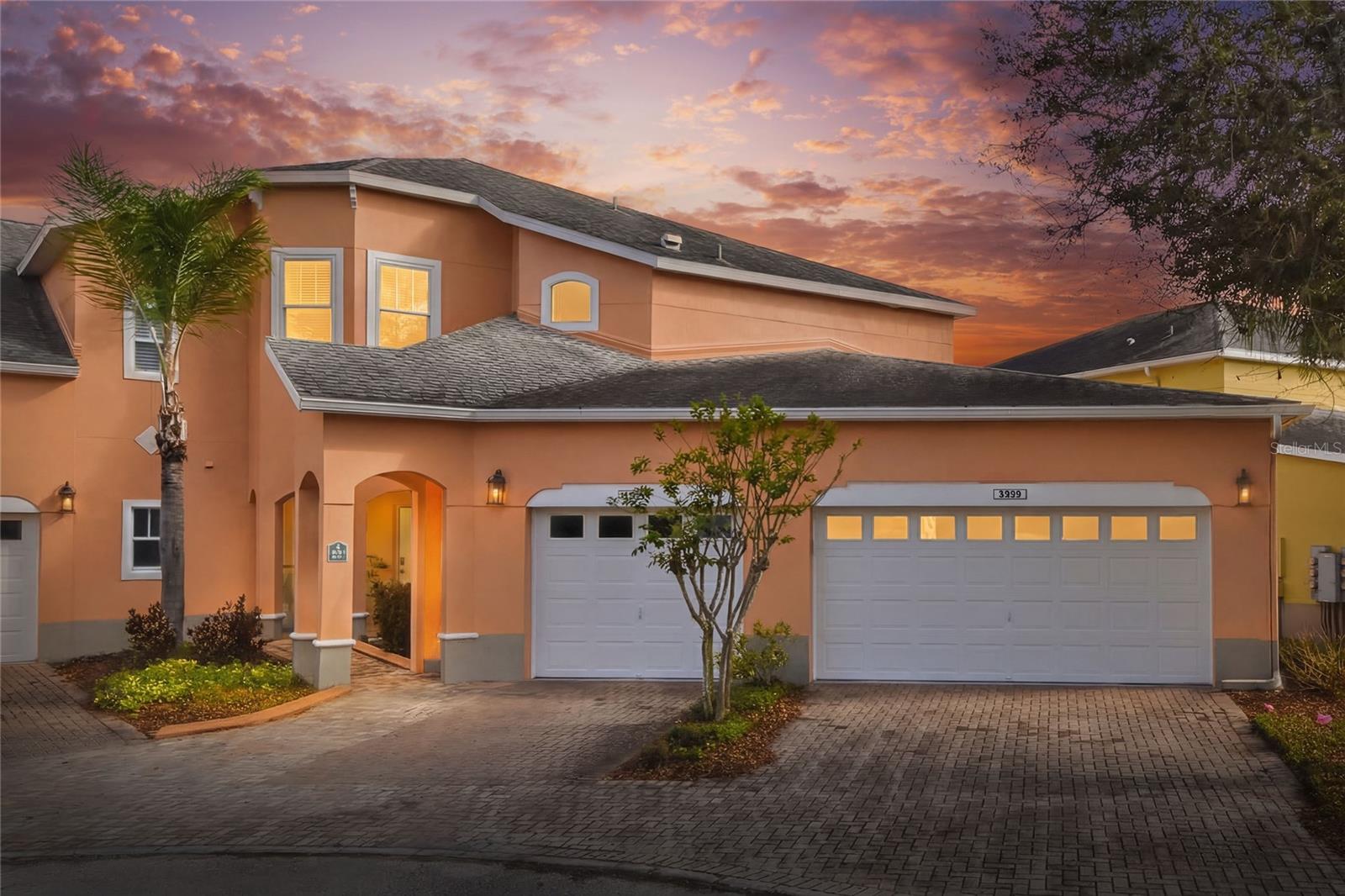 RESORT STYLE LIVING over looking a peaceful LAKE in the highly sought-after Carriage Homes at Carillon Lakes!  This spacious 3-Bedroom, 2-Bath second-floor CONDO offers the perfect blend of comfort, style, and spectacular amenities including ~COMMUNITY POOL, CLUB ROOM  to have PARTIES & EVENTS, FISHING DOCKS, WALKING TRAILS, PARK, TENNIS & PICKLEBALL COURTS.   NEW ROOF installation on condo building scheduled August 1, 2026.  BRAND NEW 2026 HVAC and WATER HEATER, Fresh Paint, and Windows replaced 2018. Enjoy the security of a gated and guarded entrance and the convenience of a private garage.  Inside you will find luxury vinyl plank and cozy carpeted flooring, a bright eat-in kitchen, and a versatile office/den space ideal for remote work or a hobby room.  The Primary suite is a true retreat with a spa-like bathroom featuring a jetted tub, walk-in shower, double vanities, and a large walk-in closet.  Additional highlights include a inside laundry room, and an abundance of natural light through out.    Located minutes to the POLK PARK-WAY, LAKELAND LINDER INTERNATIONAL AIRPORT, , Interstate 4, and surrounded by top restaurants, shopping, and medical facilities.  Perfectly situated between Tampa and Orlando for an easy commute or weekend getaway.  Don't miss this chance to experience this maintenance-free lifestyle in a beautiful lake front setting. Schedule your showing today!